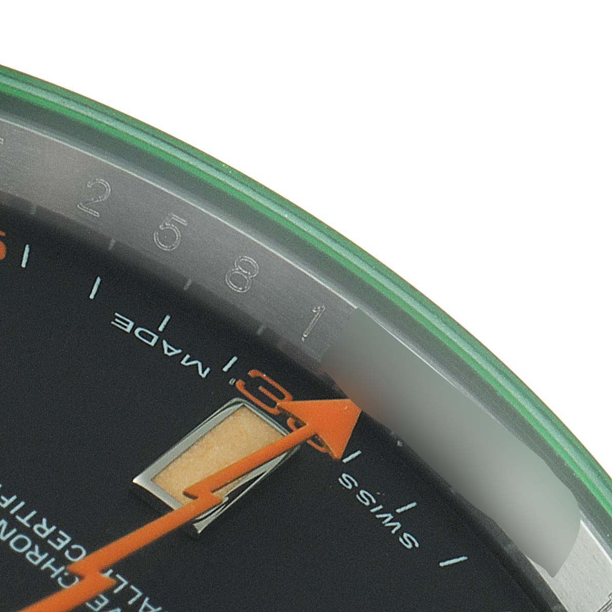 The image shows a close-up of the dial's outer edge and the orange seconds hand of a Rolex Milgauss 116400V Men's Stainless Steel Black Dial 116400V Men's Stainless Steel Black Dial watch.