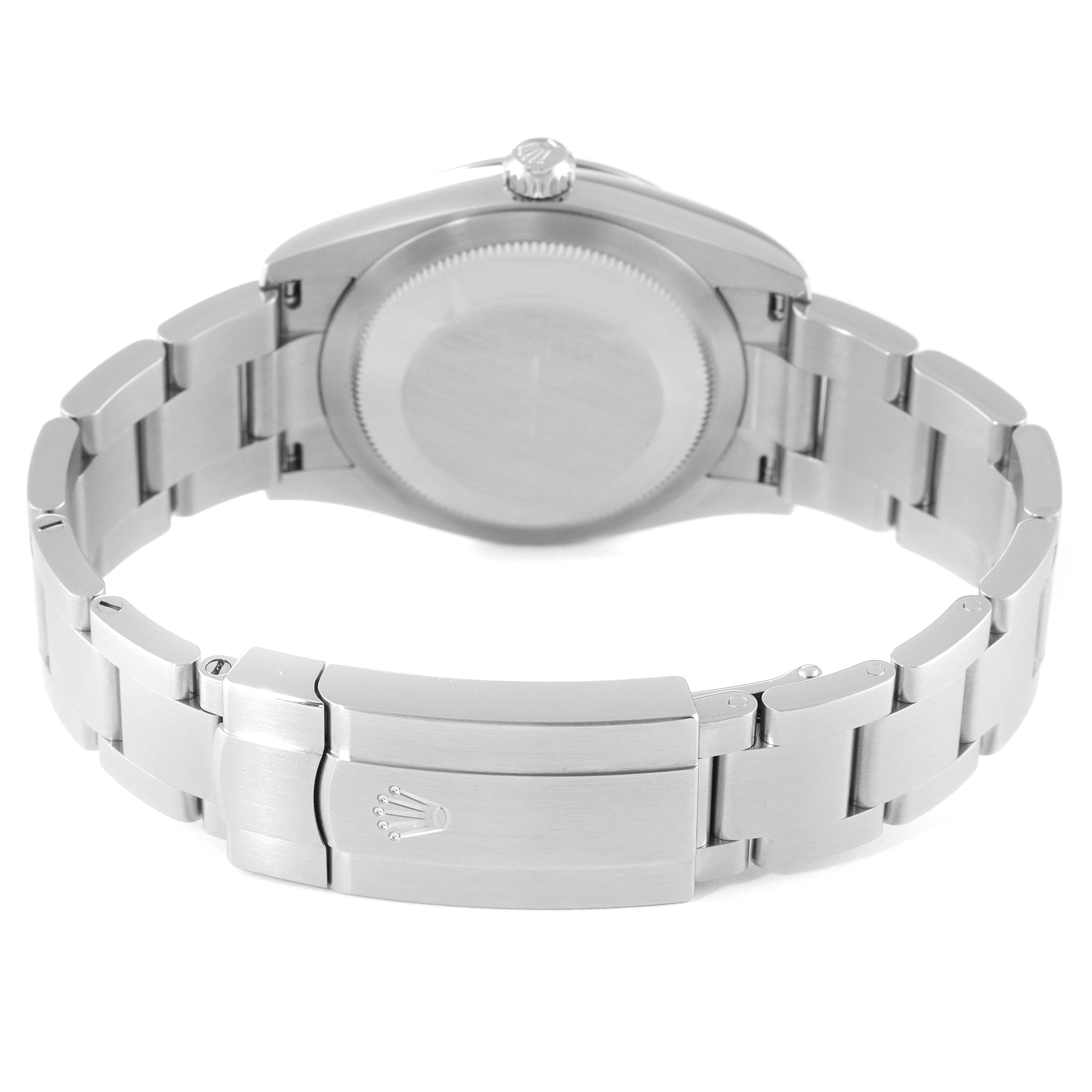 The image shows the back of a Rolex Oyster Perpetual 124200 Men's Stainless Steel Blue Dial 124200 Men's Stainless Steel Blue Dial watch, featuring its clasp and bracelet.