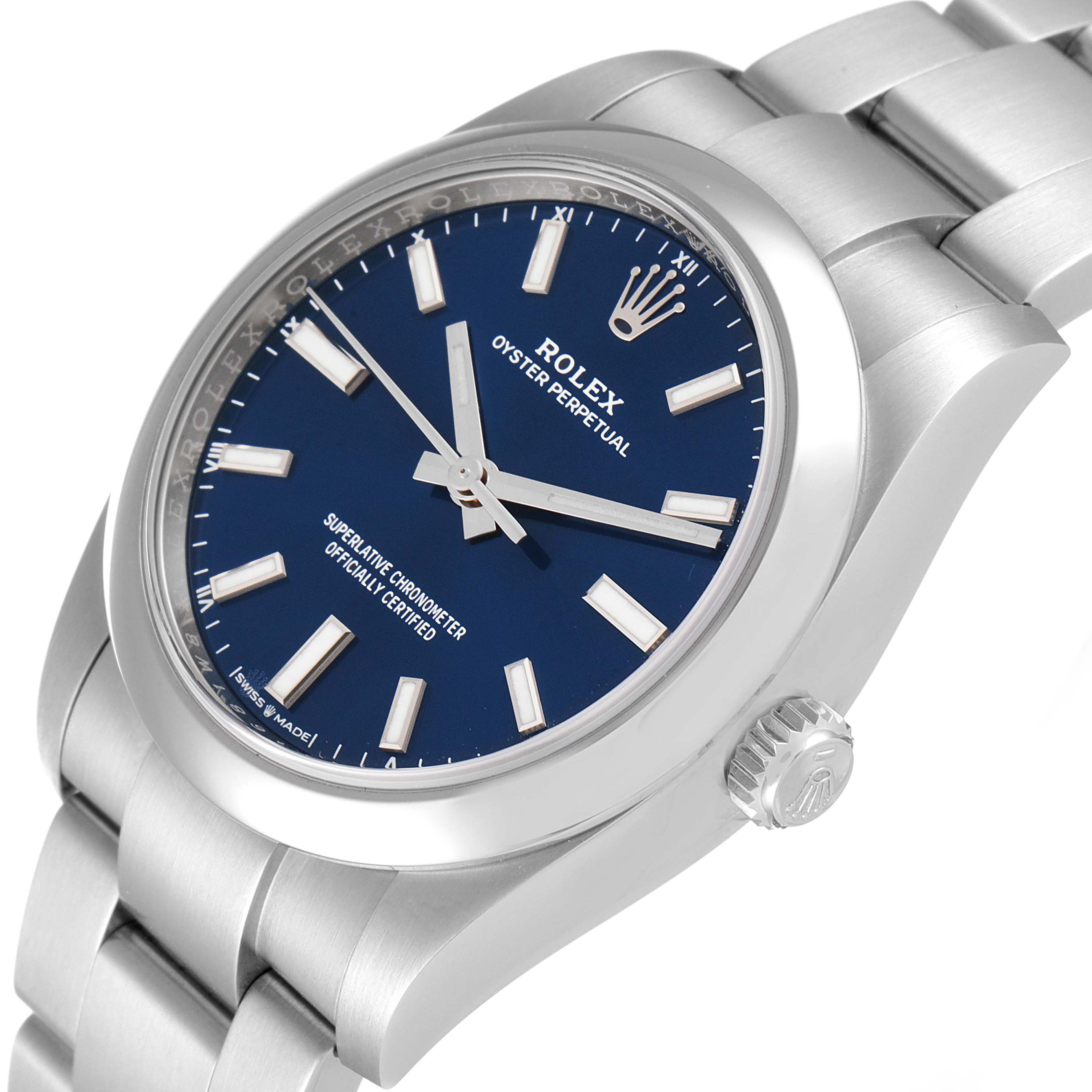 The image depicts a Rolex Oyster Perpetual 124200 Men's Stainless Steel Blue Dial 124200 Men's Stainless Steel Blue Dial watch at an oblique angle, showing the face, crown, and part of the bracelet.