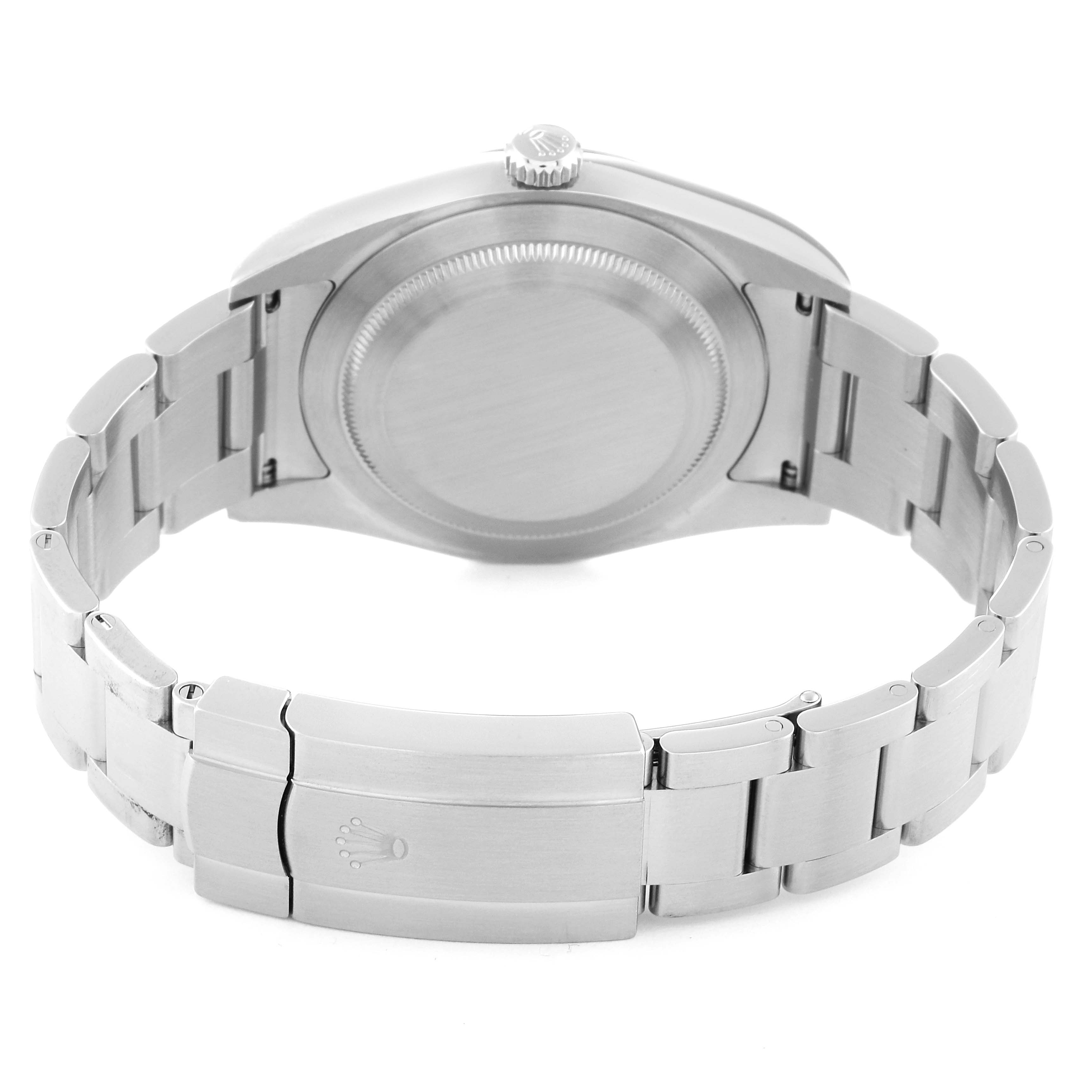 The image shows the back view of the Rolex Oyster Perpetual 114300 Men
s Stainless Steel Black Dial 114300 Men
s Stainless Steel Black Dial, highlighting its stainless steel case and bracelet with a clasp.