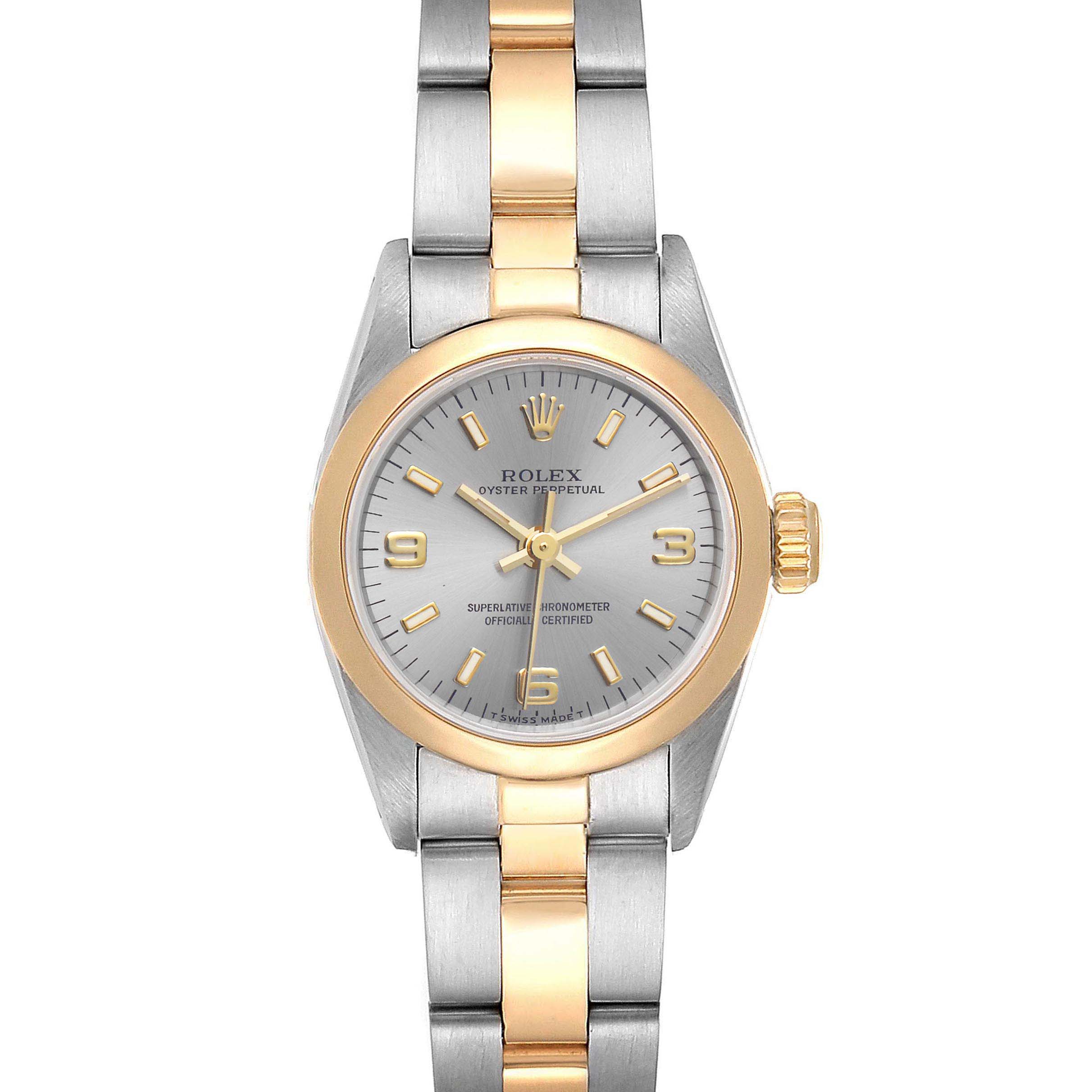 The image shows a front view of a Rolex Oyster Perpetual 67183 Women's Steel and Gold (two tone) Grey Dial 67183 Women's Steel and Gold (two tone) Grey Dial watch with a two-tone bracelet and a silver dial.