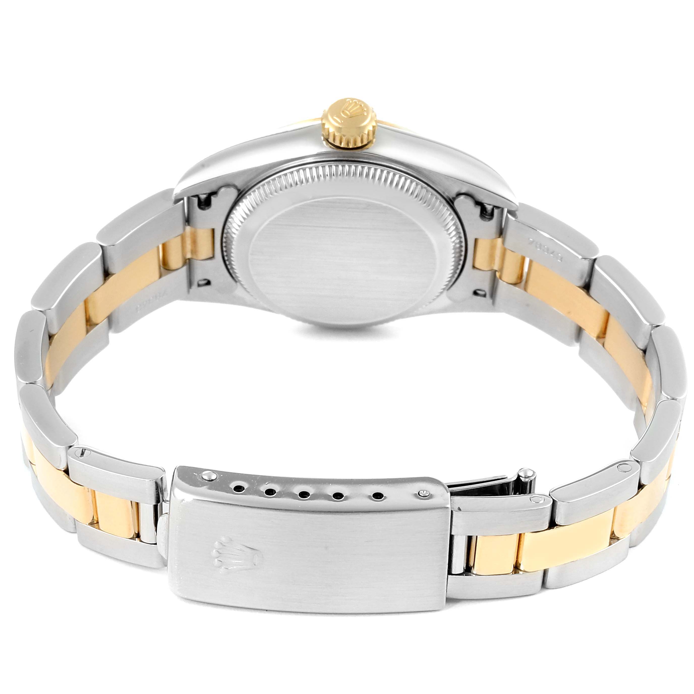 This image shows the back view of a Rolex Oyster Perpetual 67183 Women's Steel and Gold (two tone) Grey Dial 67183 Women's Steel and Gold (two tone) Grey Dial watch, highlighting its stainless steel and gold two-tone bracelet and clasp.
