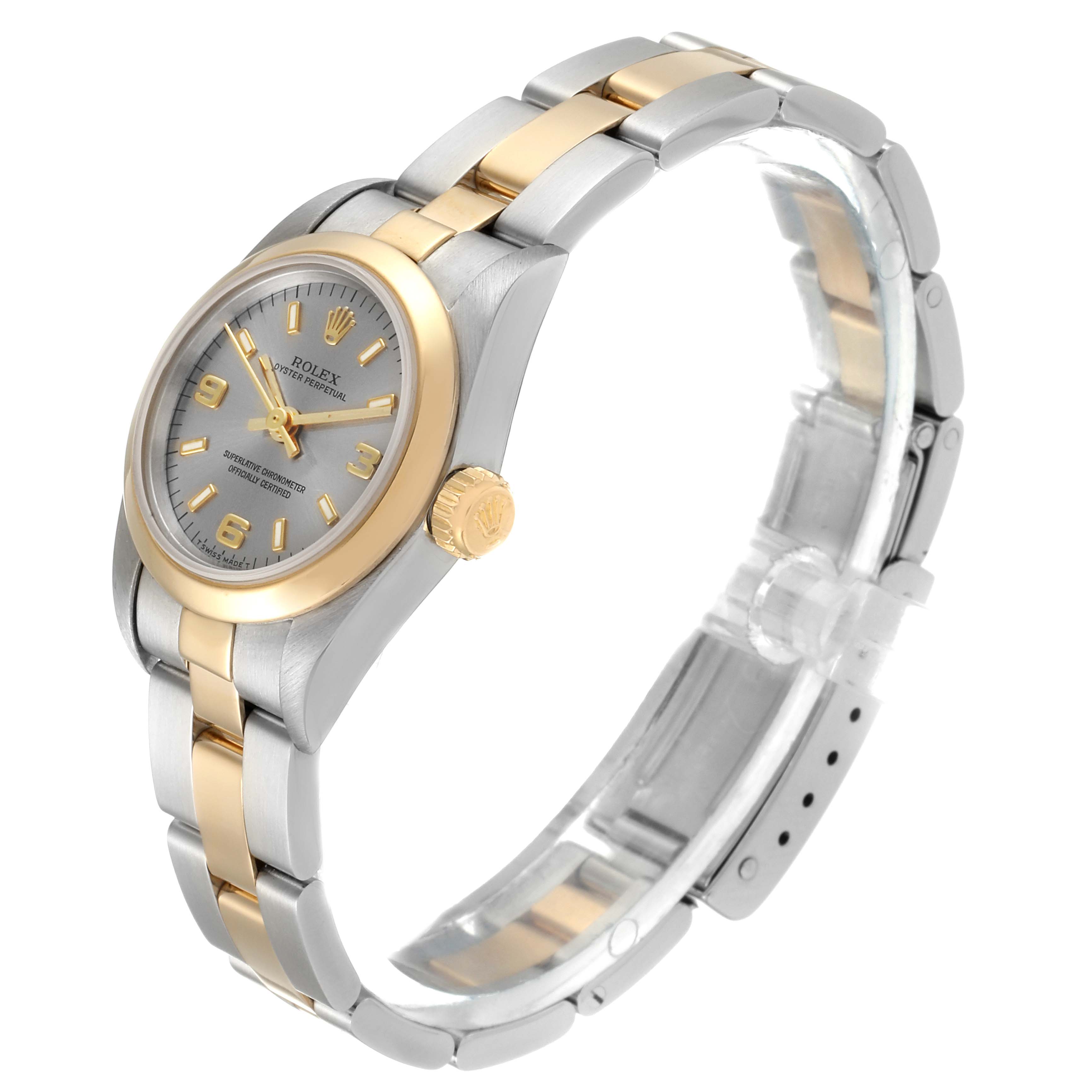 The image shows a Rolex Oyster Perpetual 67183 Women's Steel and Gold (two tone) Grey Dial 67183 Women's Steel and Gold (two tone) Grey Dial watch from a side angle, highlighting the two-tone metal bracelet, bezel, and crown.