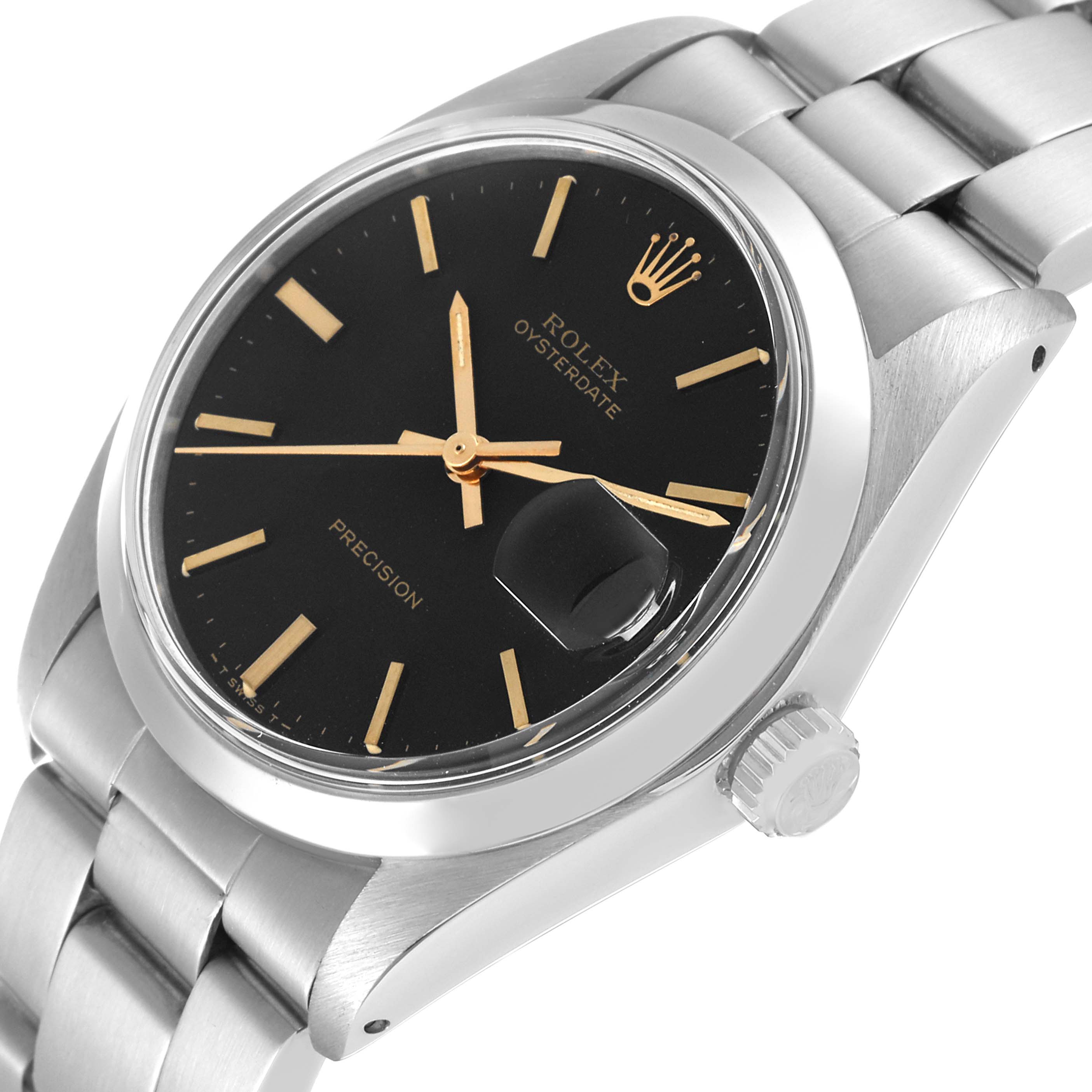 The image shows a close-up of the Rolex Vintage Collection 6694 Men's Stainless Steel Black Dial 6694 Men's Stainless Steel Black Dial model's face, crown, and part of the bracelet from a diagonal angle.
