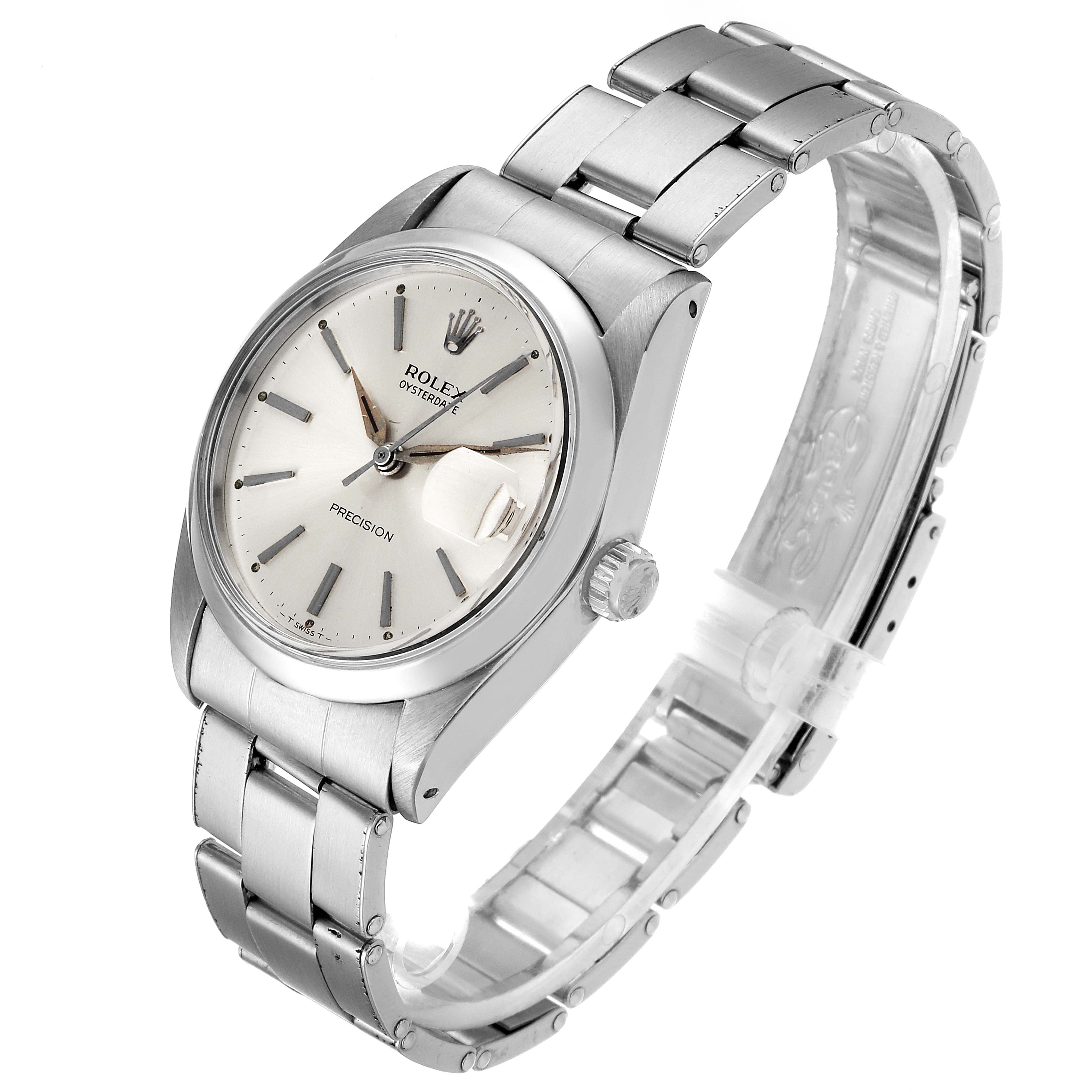 This image shows a Rolex Vintage Collection 6694 Men
s Stainless Steel Silver Dial 6694 Men
s Stainless Steel Silver Dial watch at an angled side view, highlighting the dial, bezel, crown, and bracelet.