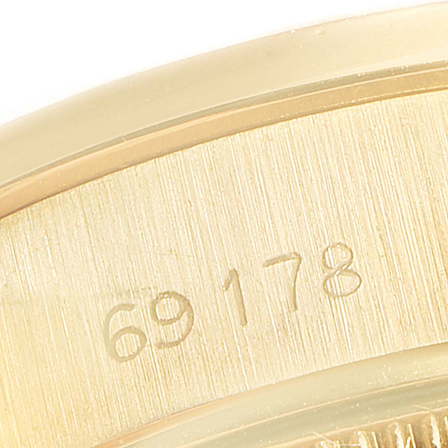 This close-up image shows the engraved model number 69178 on the inner part of a Rolex President 69178 Women
s Yellow Gold Champagne Dial 69178 Women
s Yellow Gold Champagne Dial watch.