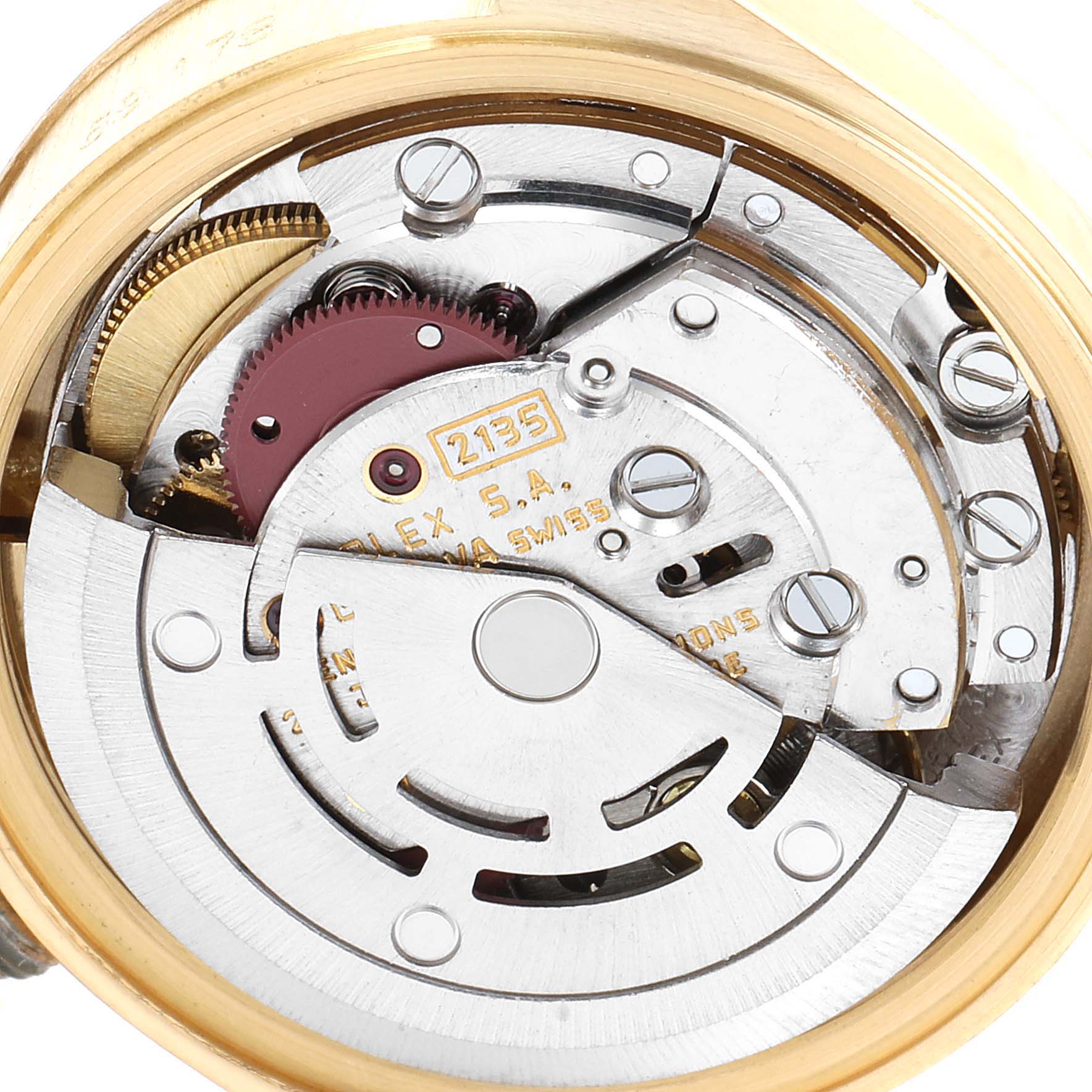 This image shows the internal mechanical movement of a Rolex President 69178 Women
s Yellow Gold Champagne Dial 69178 Women
s Yellow Gold Champagne Dial watch, viewed from the back.