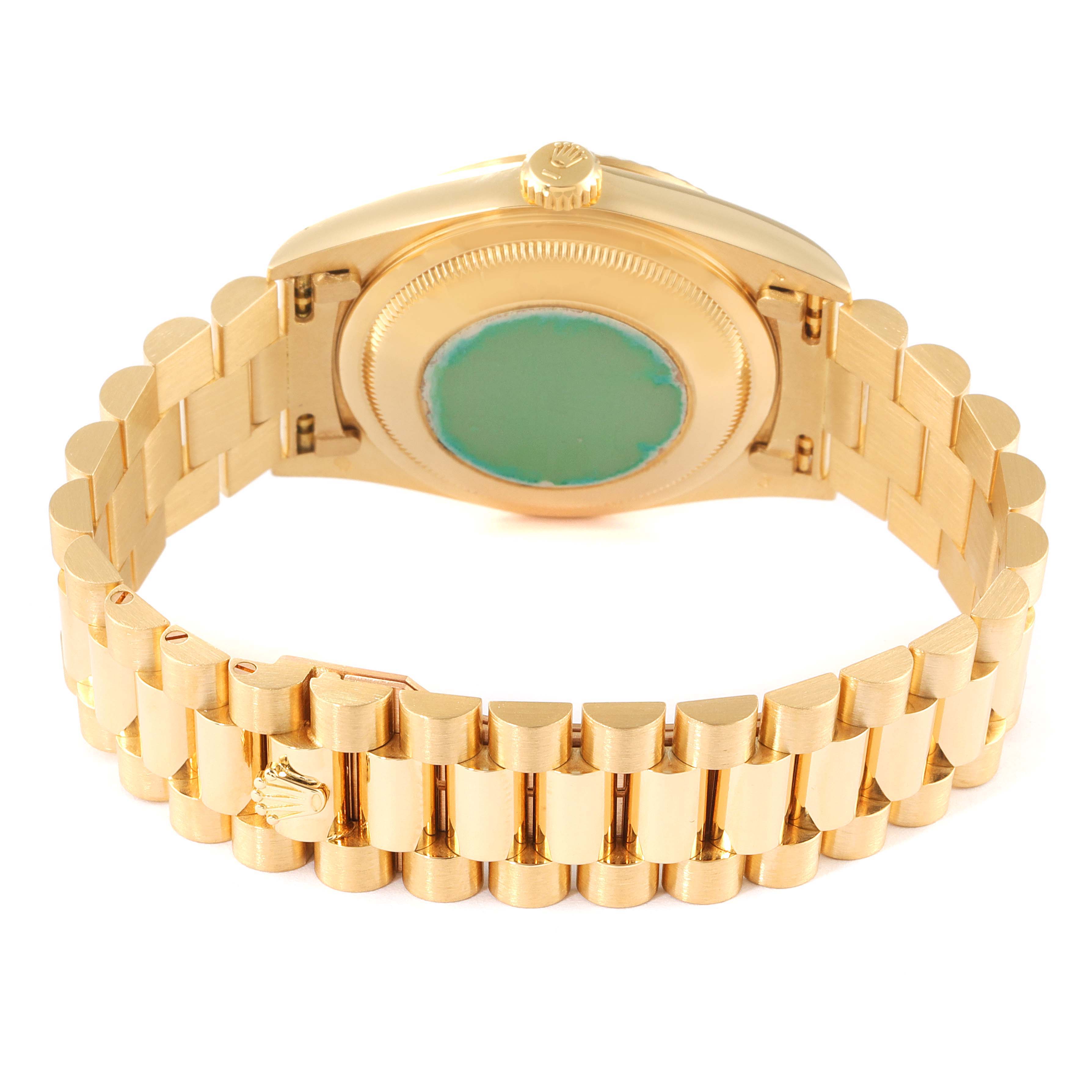 This image shows the back view of a Rolex President 18238 Men
s Yellow Gold Champagne Dial 18238 Men
s Yellow Gold Champagne Dial model watch, highlighting the bracelet and case back.