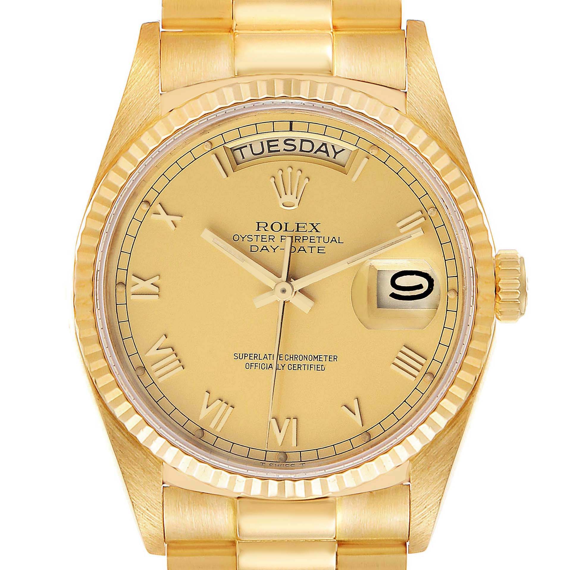 The image shows a frontal view of a Rolex President 18038 Men's Yellow Gold Champagne Dial 18038 Men's Yellow Gold Champagne Dial model watch, displaying its dial, hands, day window, and date window with a cyclops lens.