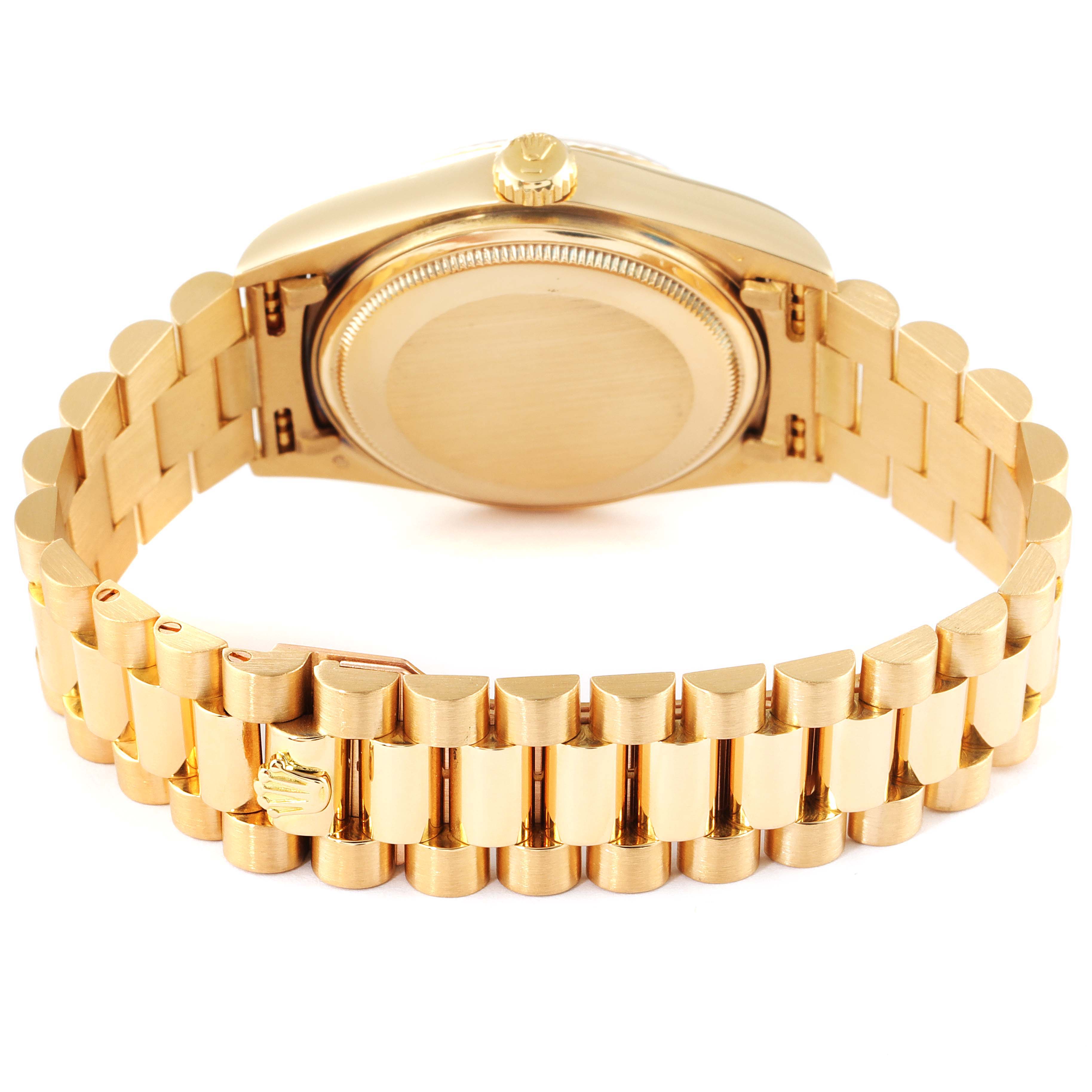 The image shows the back and bracelet of the Rolex President 18038 Men
s Yellow Gold Silver Dial 18038 Men
s Yellow Gold Silver Dial model watch, focusing on the caseback and the gold link band.