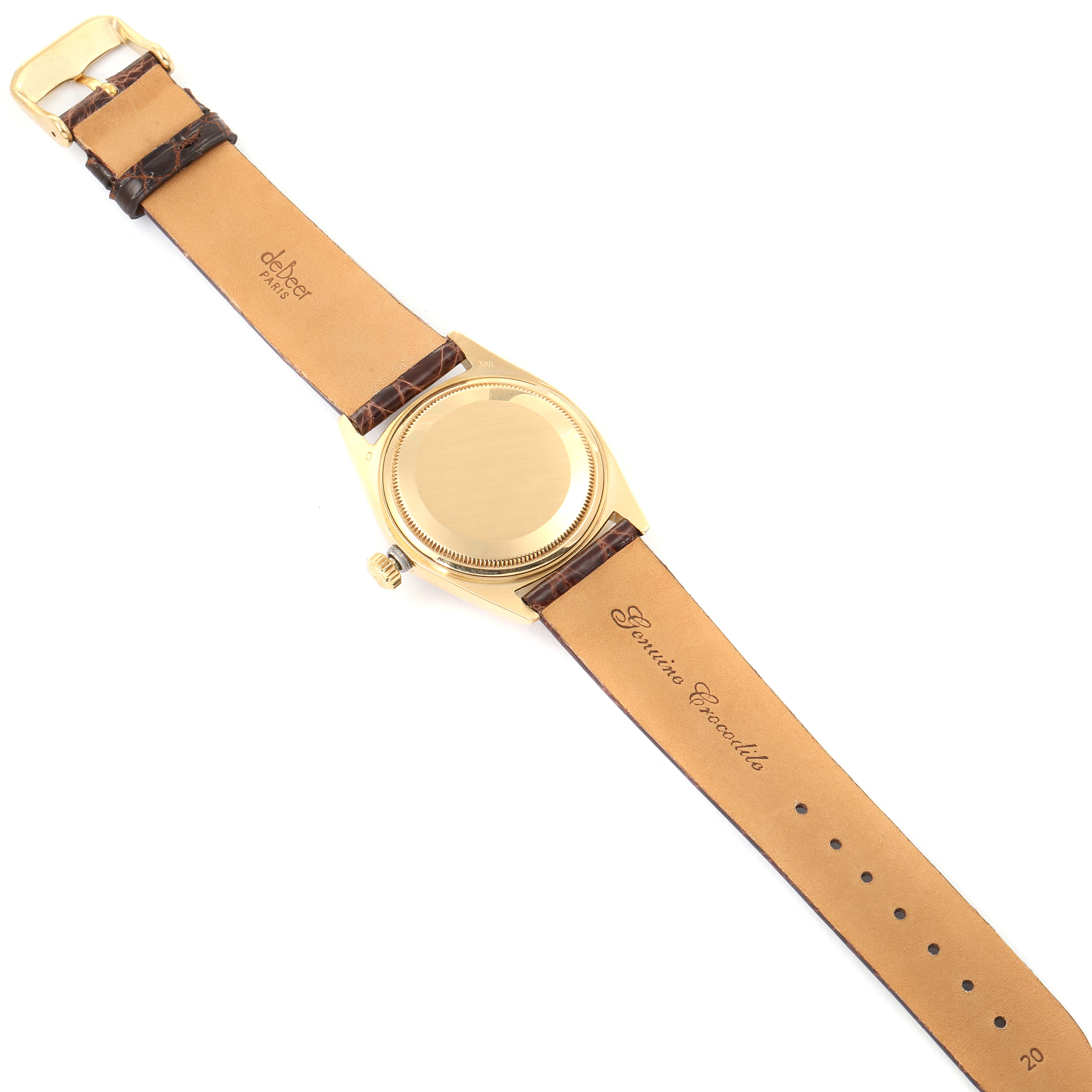 The watch is pictured from the back, showing the case back, crown, and leather strap of the Rolex Vintage Collection 1803 Men's Yellow Gold Champagne Dial 1803 Men's Yellow Gold Champagne Dial model.