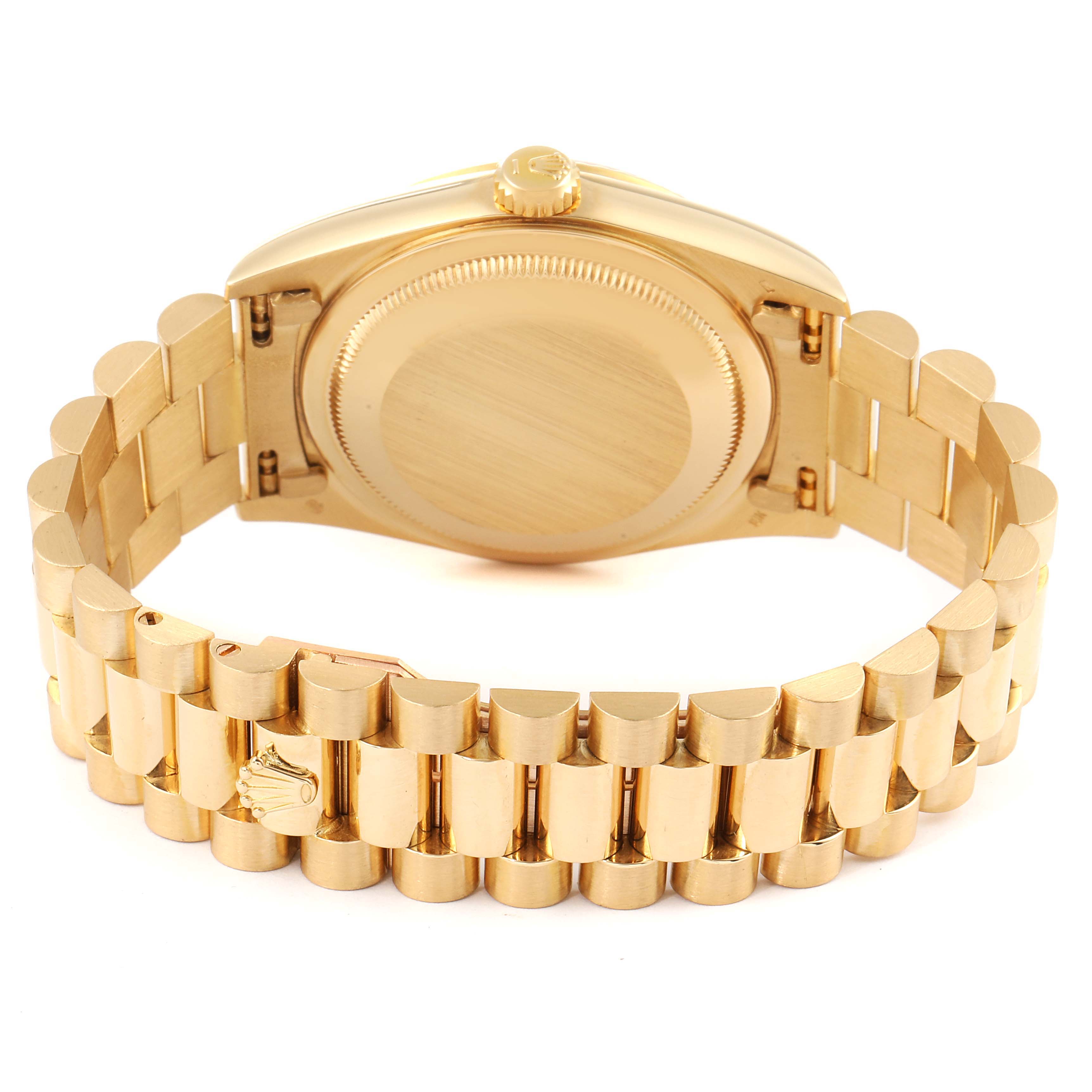This image shows the back of a Rolex President 18238 Men's Yellow Gold Champagne Dial 18238 Men's Yellow Gold Champagne Dial model watch, highlighting the case back, crown, and bracelet.