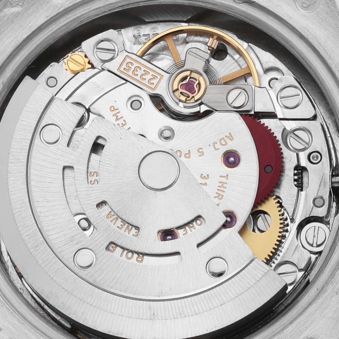 This image shows the intricate movement mechanism of the Rolex President 179136 Women's Platinum Blue Dial 179136 Women's Platinum Blue Dial model, featuring gears and the rotor.