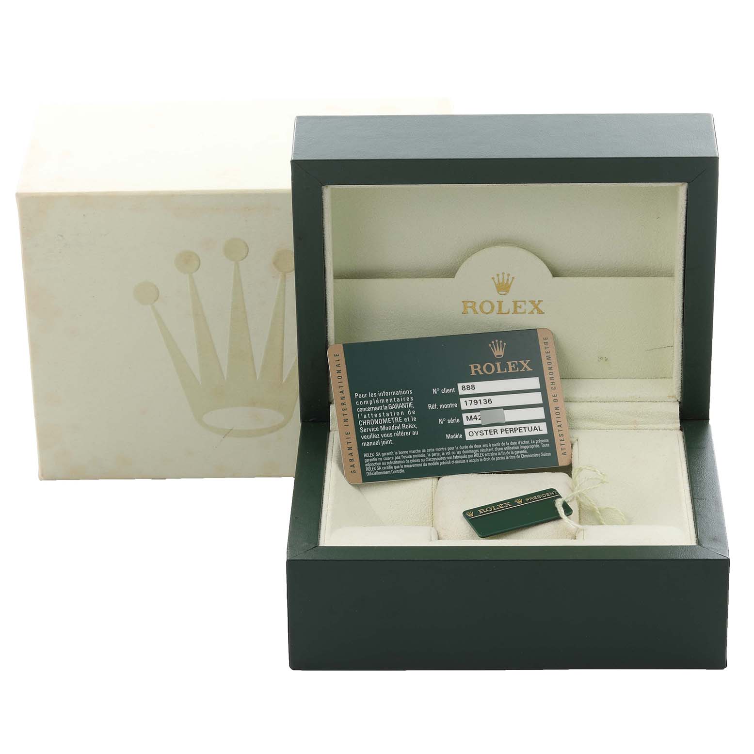 The image shows a Rolex President 179136 Women's Platinum Blue Dial 179136 Women's Platinum Blue Dial model watch box and accessories, including a warranty card and tag, viewed from the front.