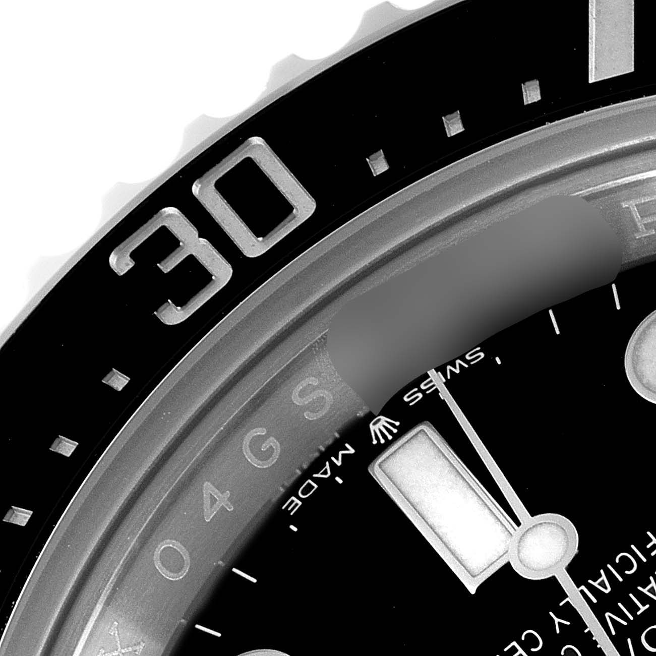 This image shows a close-up of the bezel and part of the dial of a Rolex Sea-Dweller 126600 Men
s Stainless Steel Black Dial 126600 Men
s Stainless Steel Black Dial watch, including the "30" marking.