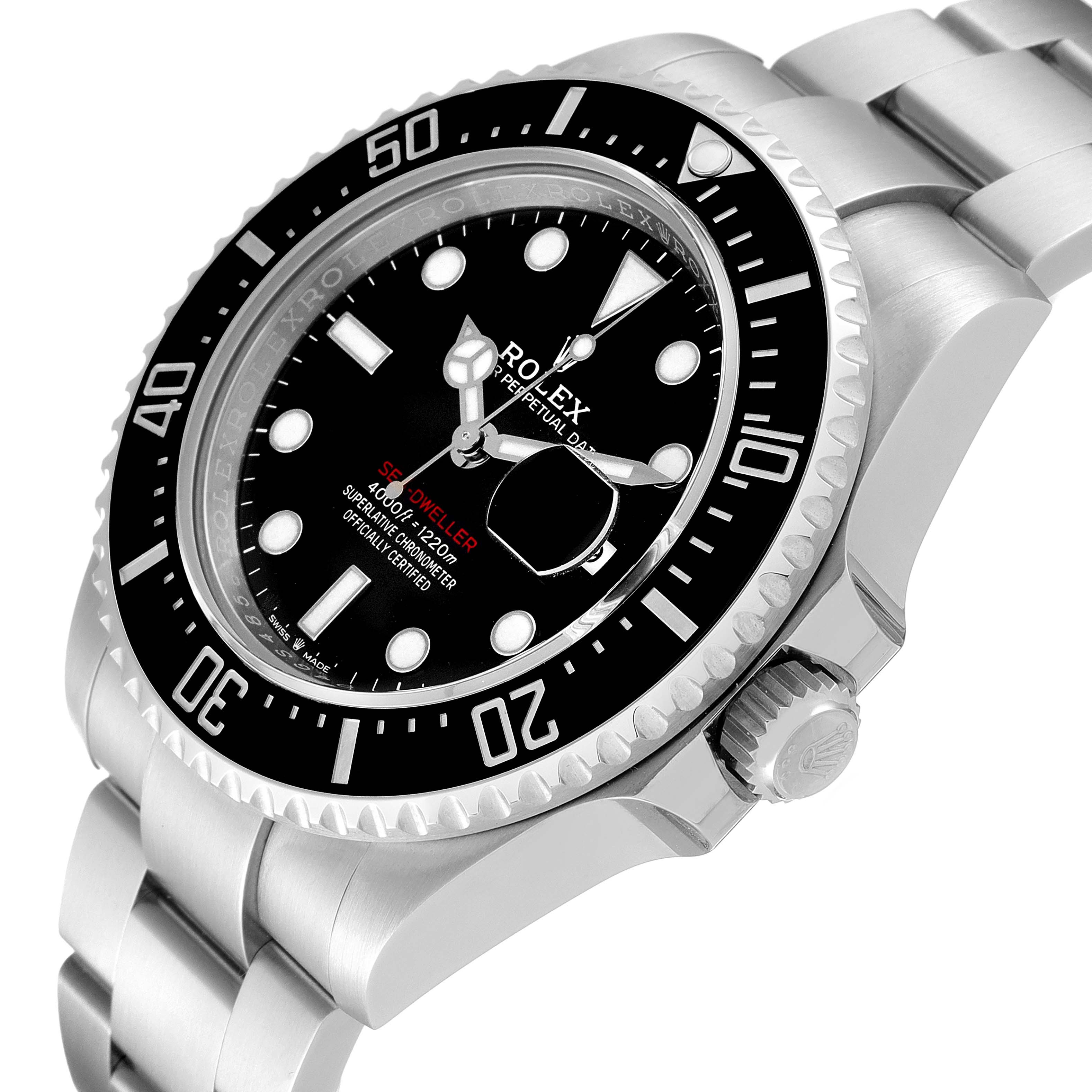 This Rolex Sea-Dweller 126600 Men
s Stainless Steel Black Dial 126600 Men
s Stainless Steel Black Dial watch is shown angled from the top right, highlighting its face, bezel, and part of the band.