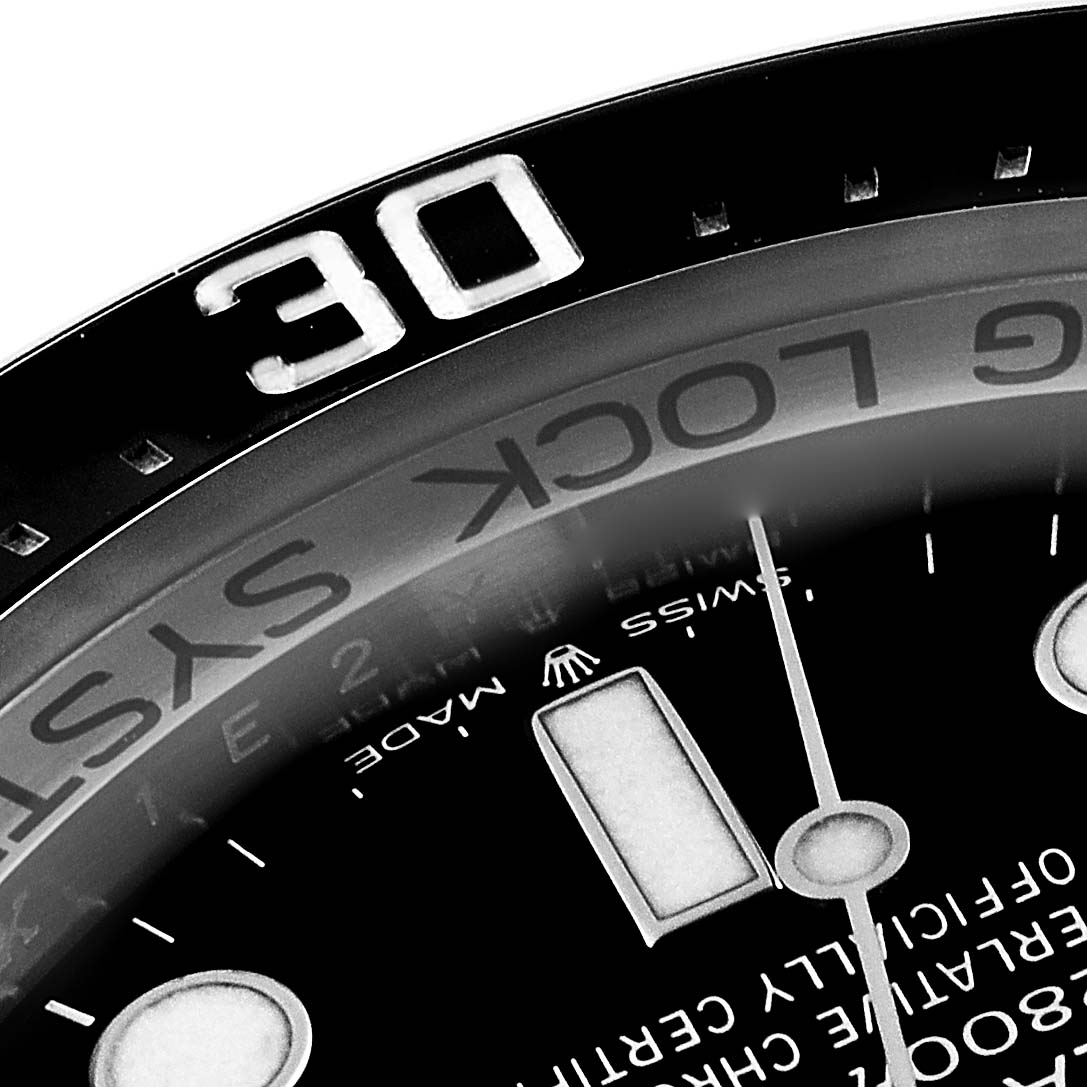 This image shows a close-up view of the bezel and dial of a Rolex Sea-Dweller 126660 Men
s Stainless Steel Blue Dial 126660 Men
s Stainless Steel Blue Dial watch, focusing on the 
30
 marker.