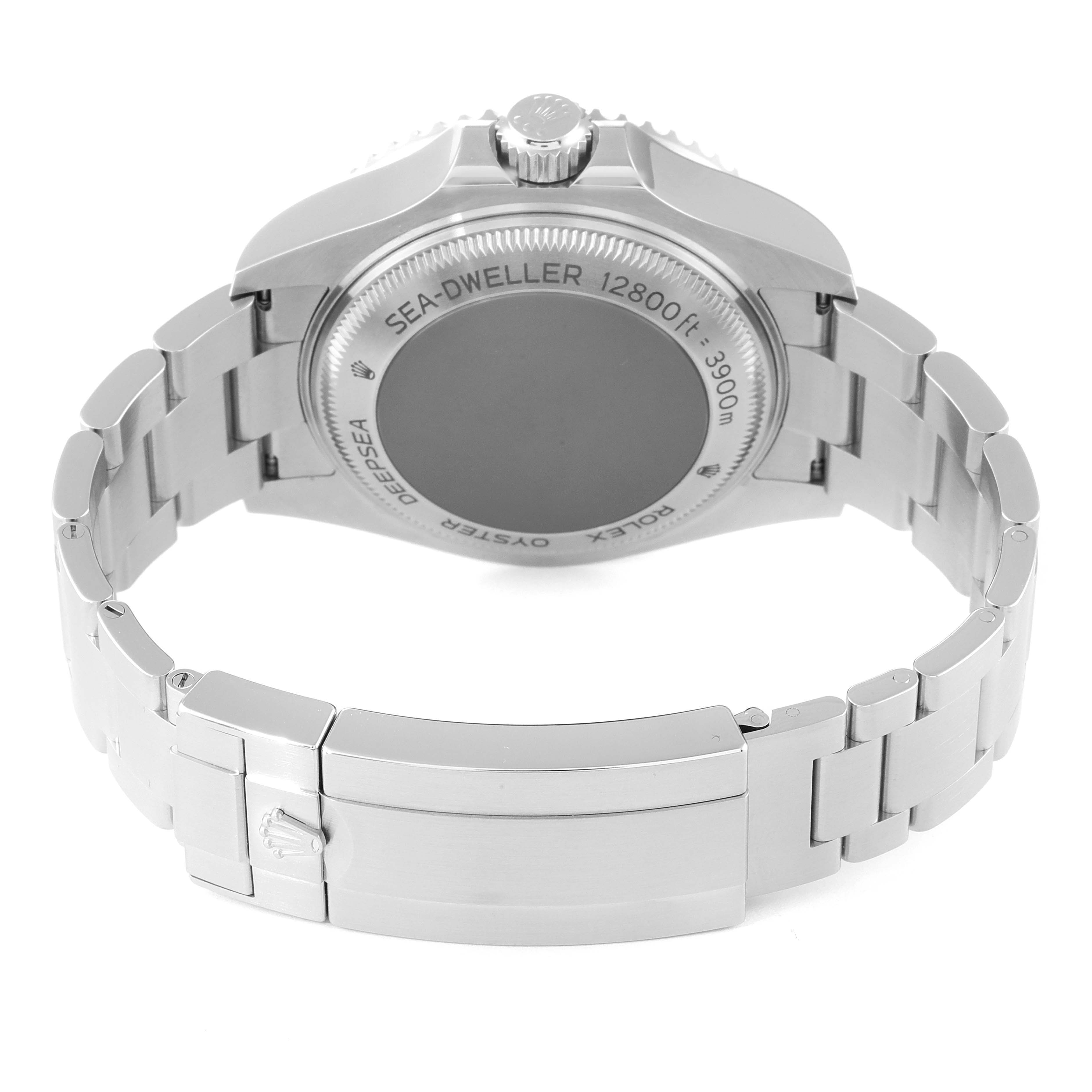 The image shows the back case and clasp of a Rolex Sea-Dweller 126660 Men
s Stainless Steel Blue Dial 126660 Men
s Stainless Steel Blue Dial watch at an angle, highlighting its bracelet and rear engravings.