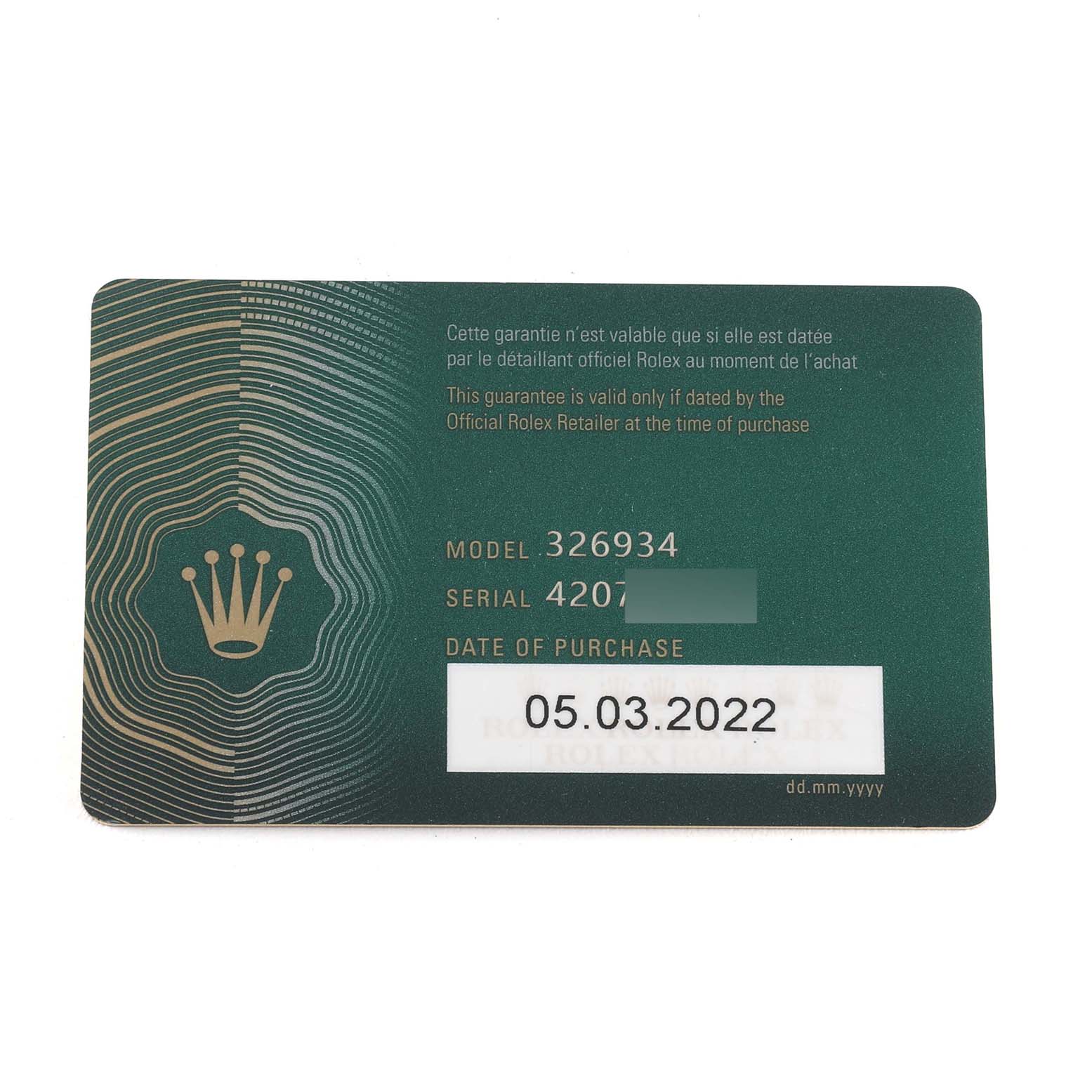 This image shows the official guarantee card for the Rolex Sky-Dweller 326934 Men
s Stainless Steel White Dial 326934 Men
s Stainless Steel White Dial model 326934, displaying purchase date and partial serial number.