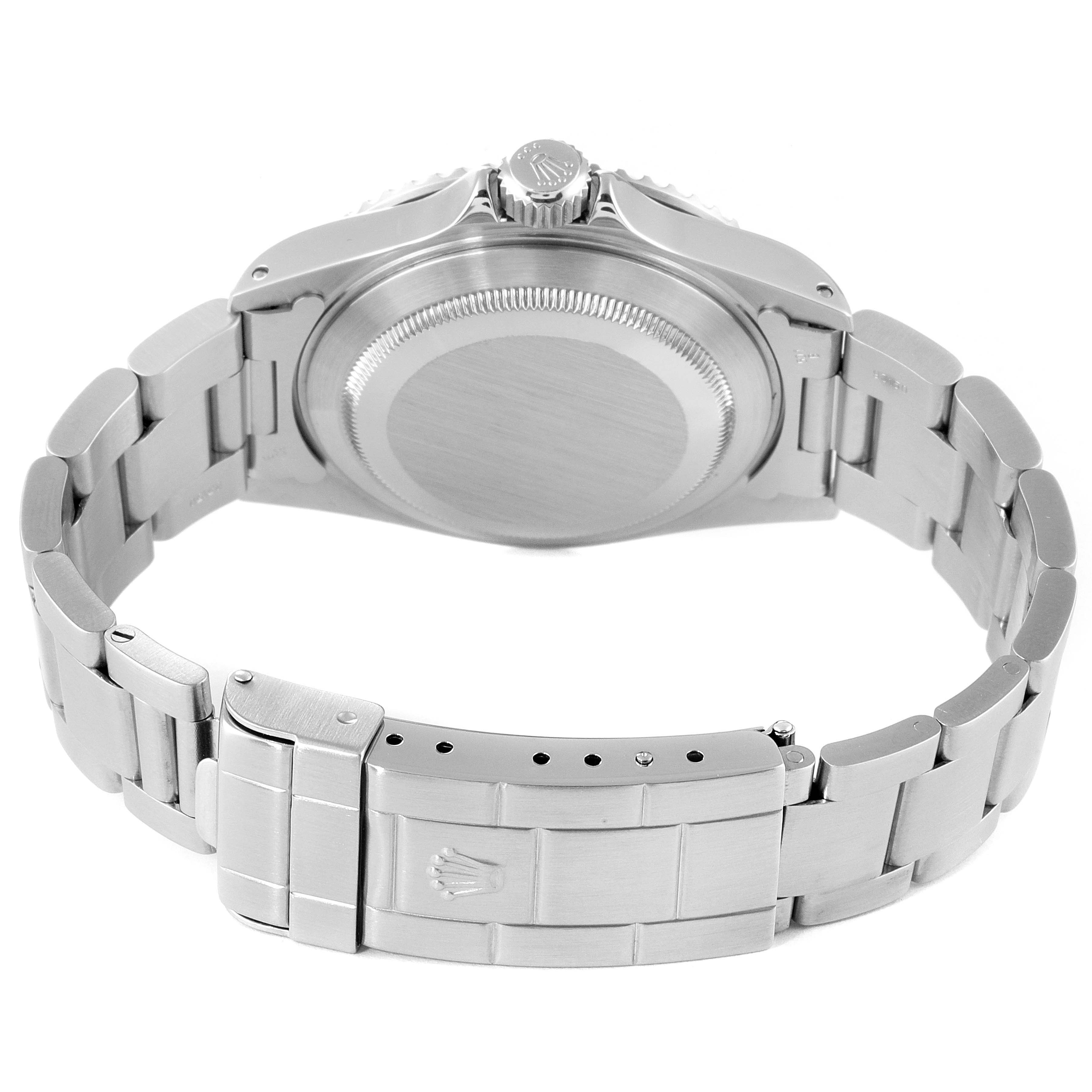 This image shows the back case and bracelet of a Rolex Submariner 14060 Men
s Stainless Steel Black Dial 14060 Men
s Stainless Steel Black Dial watch from a rear angle.