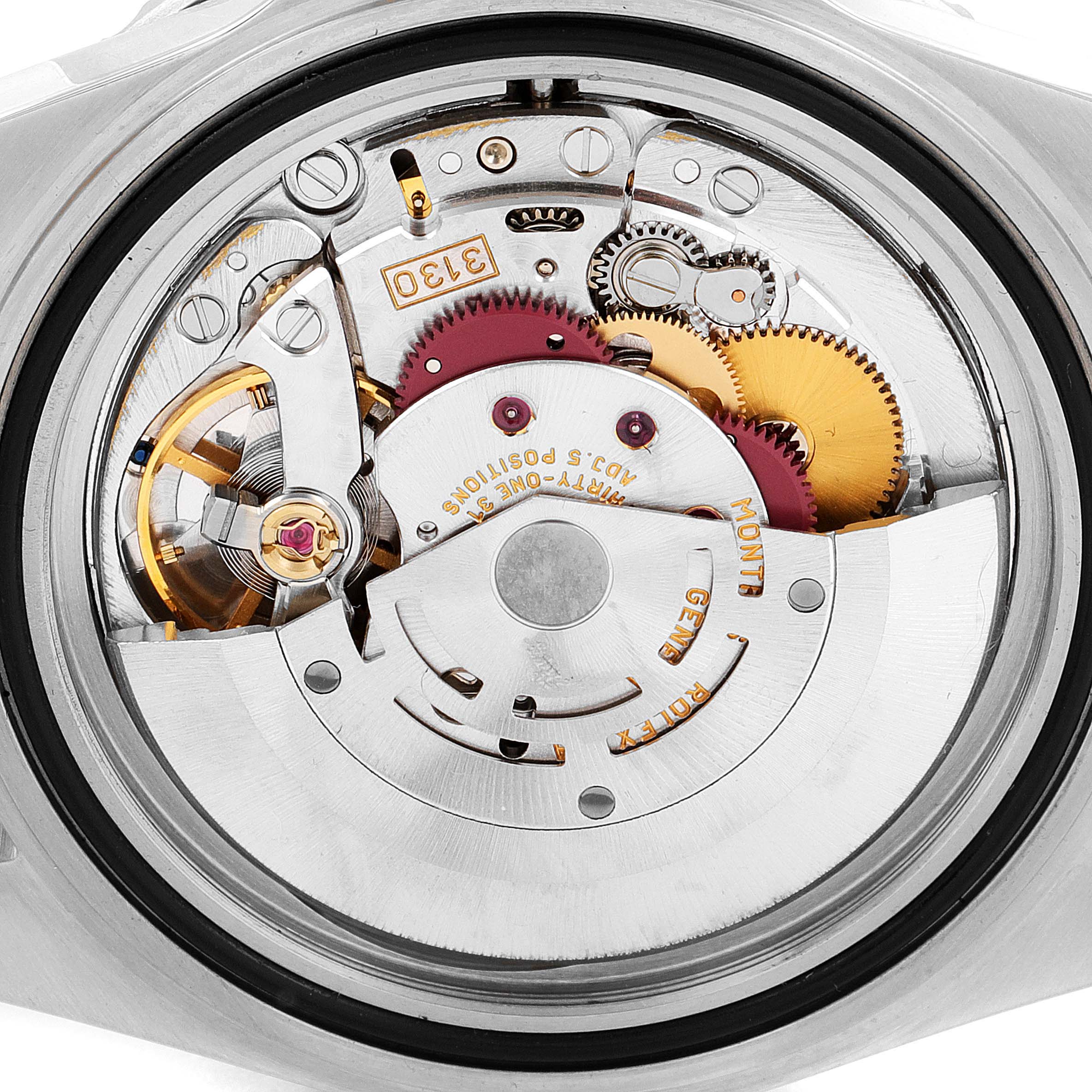 The image shows the detailed internal mechanism of a Rolex Submariner 14060 Men
s Stainless Steel Black Dial 14060 Men
s Stainless Steel Black Dial model watch from a rear, open-case angle.