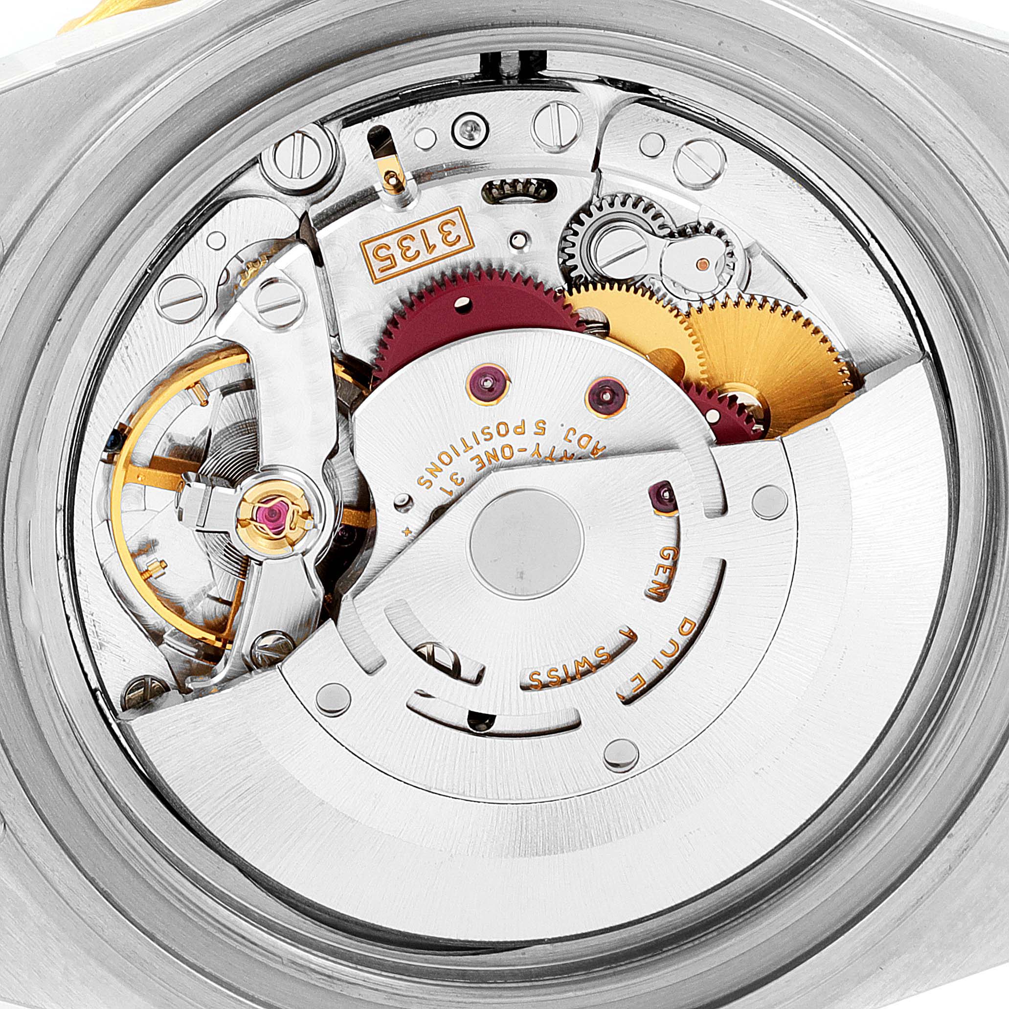 This image shows the movement and internal mechanics of the Rolex Submariner 16613 Men's Steel and Gold (two tone) Blue Dial 16613 Men's Steel and Gold (two tone) Blue Dial watch from a top-down angle.