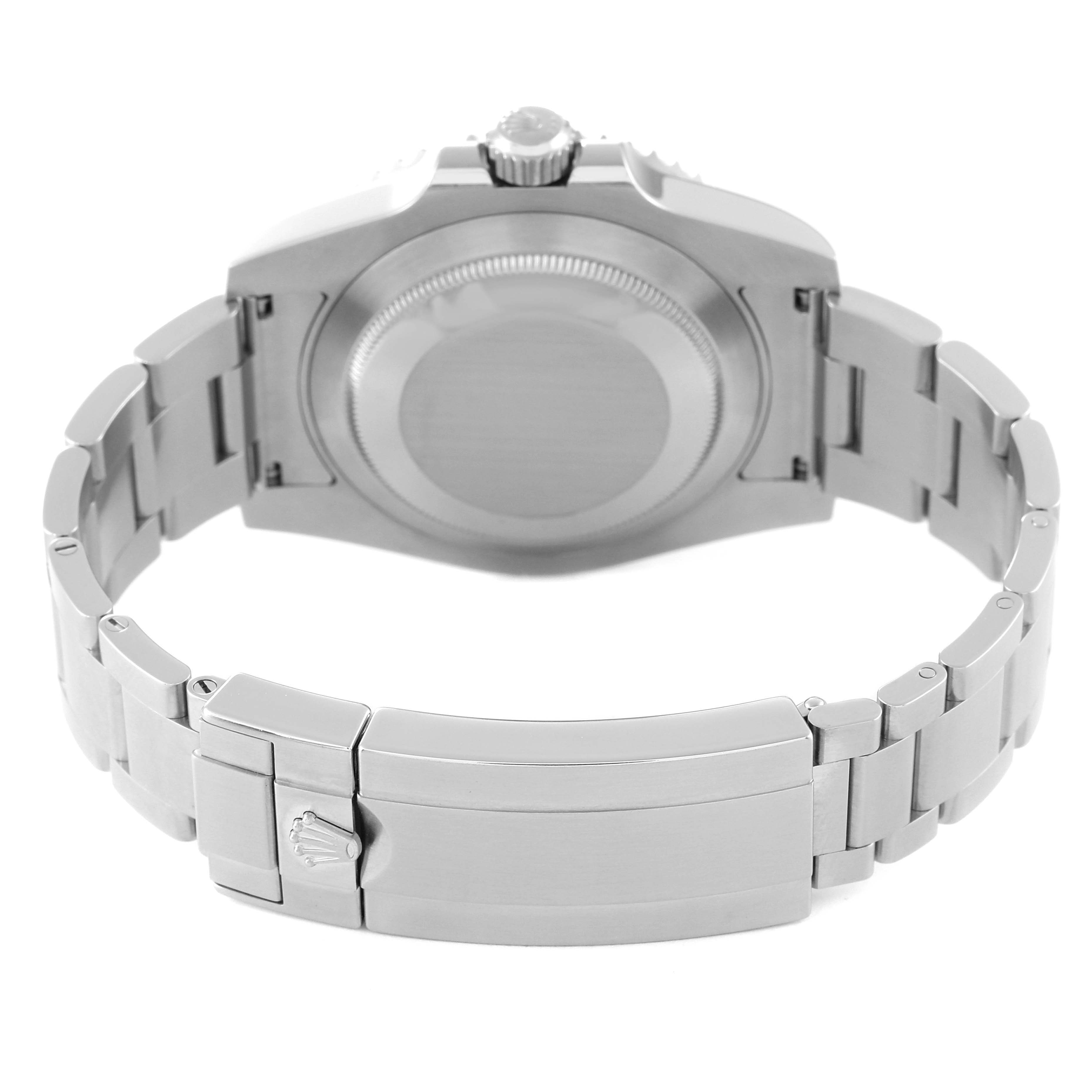 The image shows the back view of a Rolex Submariner 116610LV Men
s Stainless Steel Green Dial 116610LV Men
s Stainless Steel Green Dial watch, highlighting the case back and bracelet clasp.