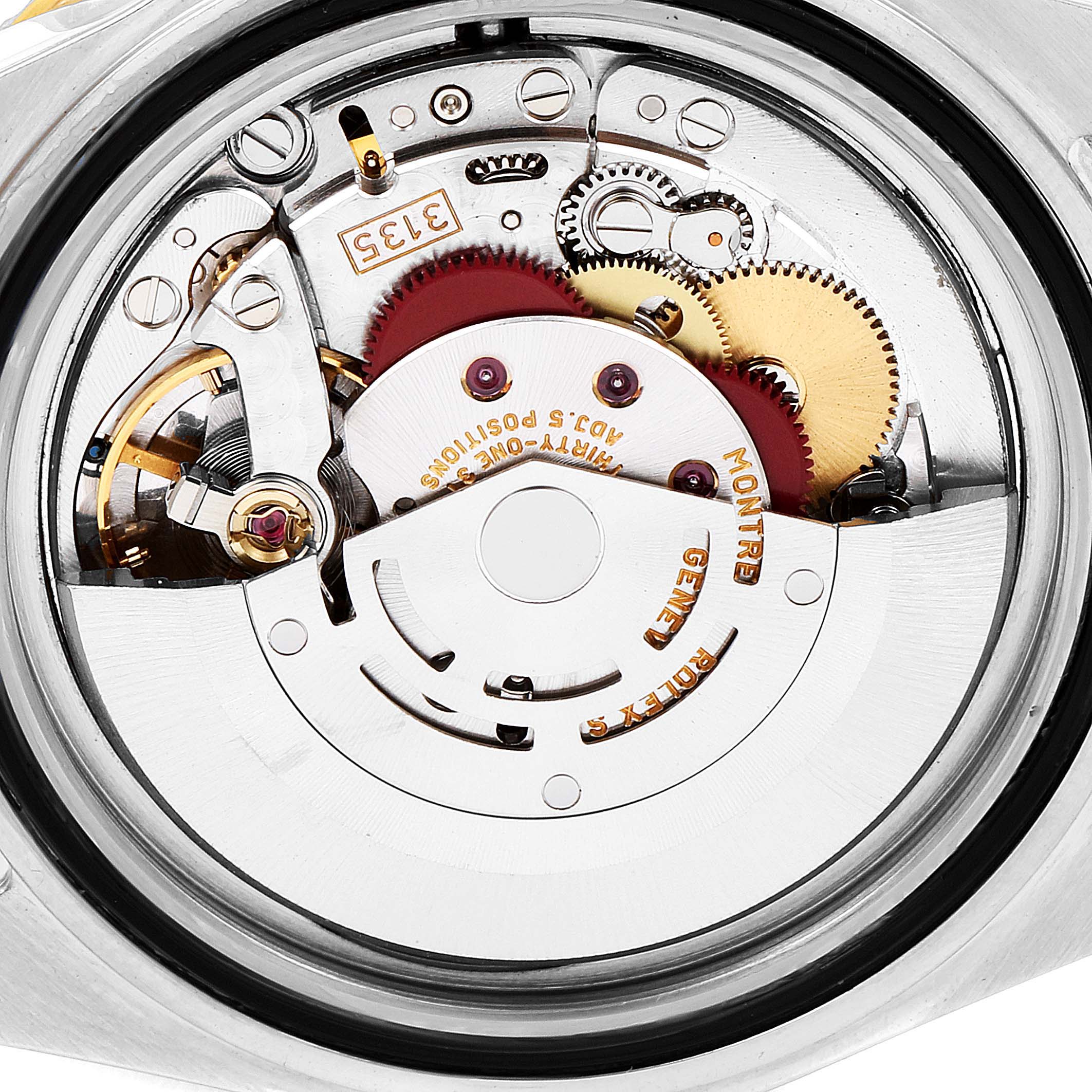 This is a close-up view of the movement mechanism inside a Rolex Submariner 16613 Men
s Steel and Gold (two tone) Grey Dial 16613 Men
s Steel and Gold (two tone) Grey Dial watch.