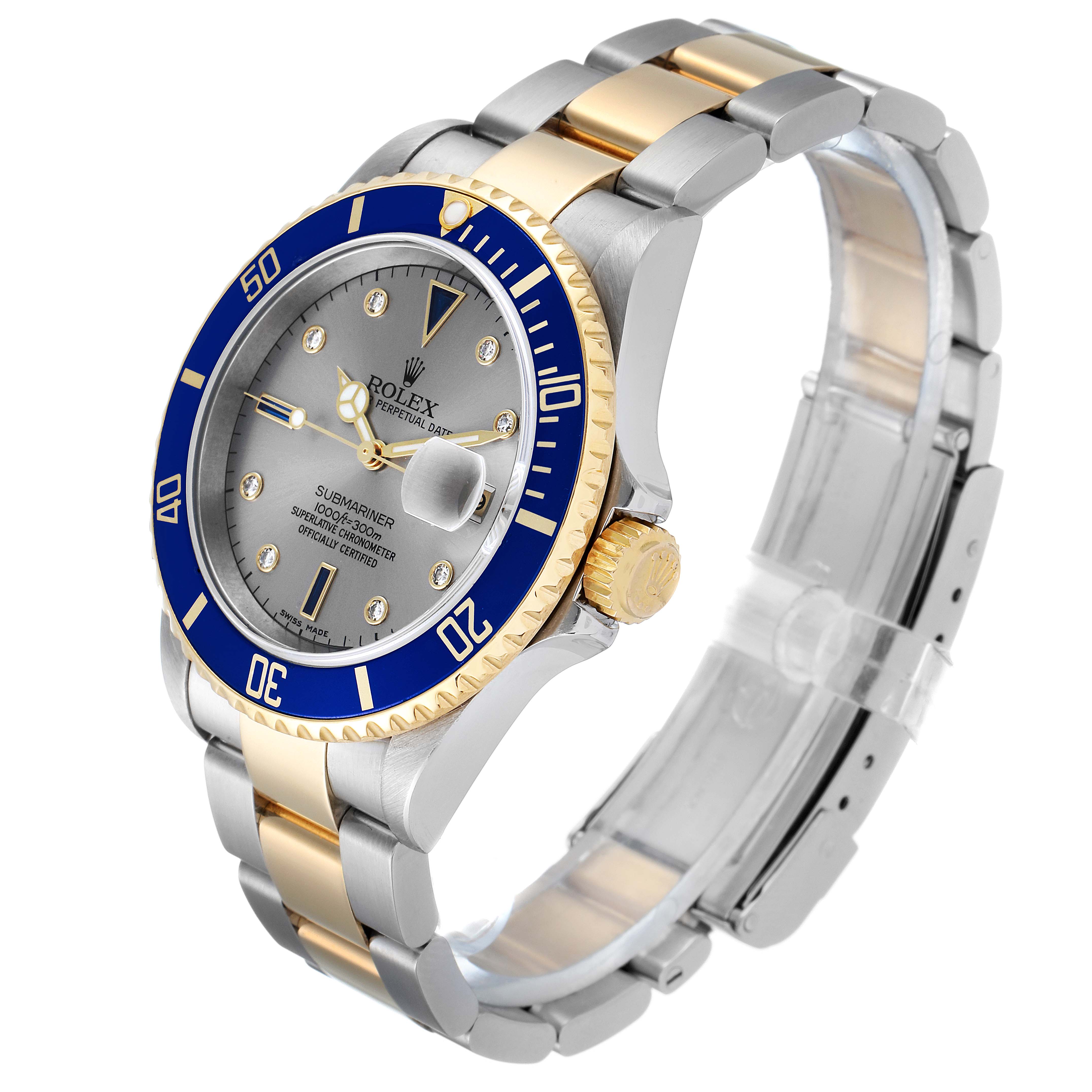 This image shows a three-quarters angle view of a Rolex Submariner 16613 Men
s Steel and Gold (two tone) Grey Dial 16613 Men
s Steel and Gold (two tone) Grey Dial watch, highlighting its dial, bezel, crown, and bracelet.