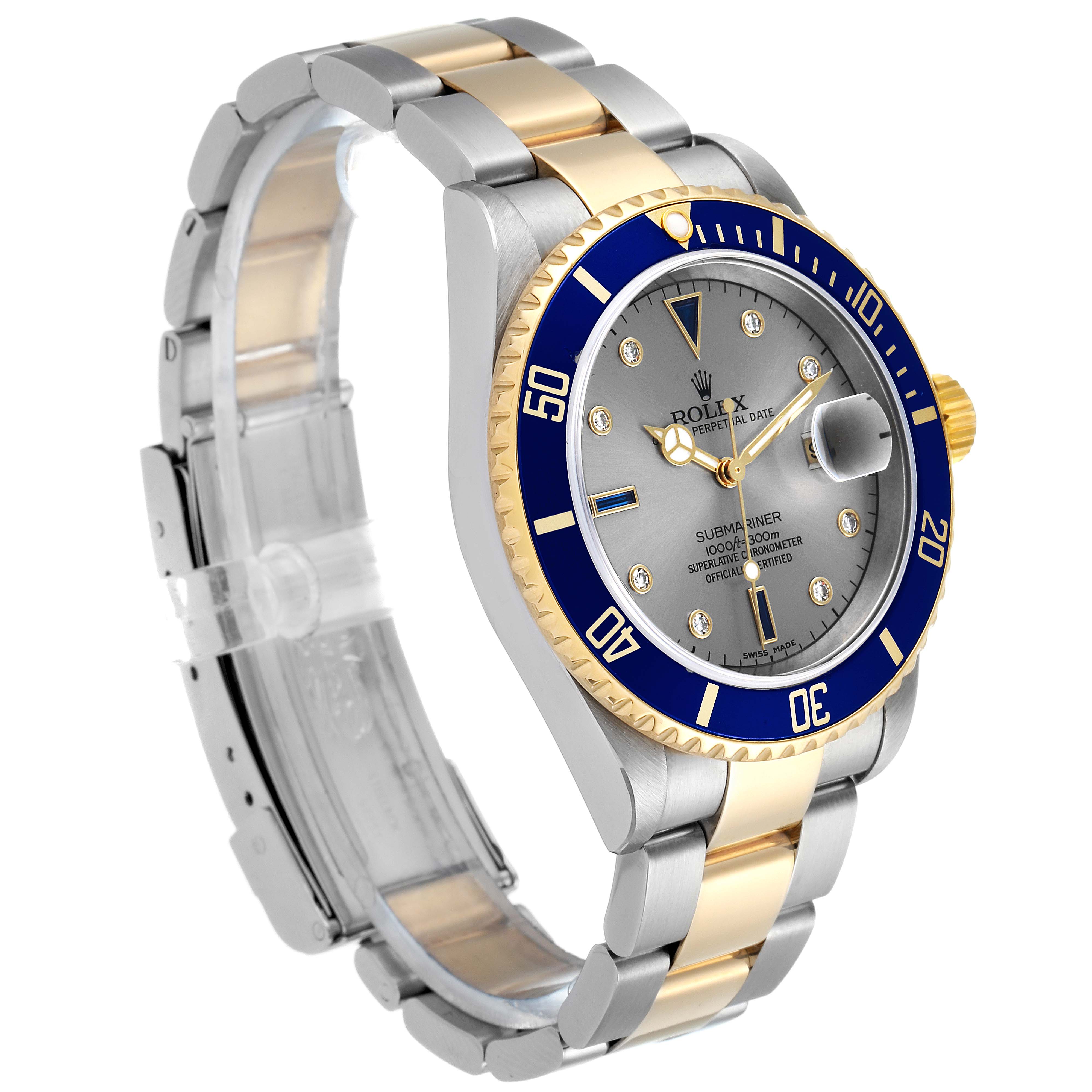 The Rolex Submariner 16613 Men
s Steel and Gold (two tone) Grey Dial 16613 Men
s Steel and Gold (two tone) Grey Dial watch is shown at a slight angle, displaying the dial, bezel, bracelet, and clasp.