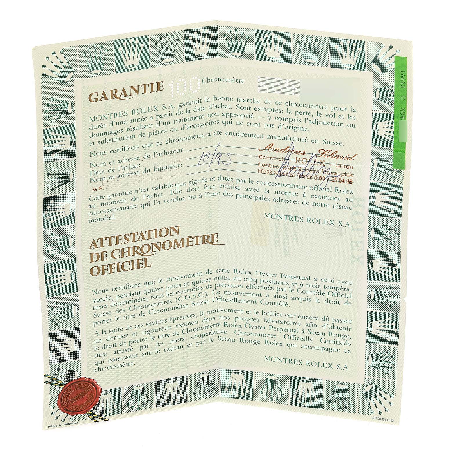 This image shows the official warranty and chronometer certification papers for a Rolex Submariner 16613 Men's Steel and Gold (two tone) Grey Dial 16613 Men's Steel and Gold (two tone) Grey Dial watch.