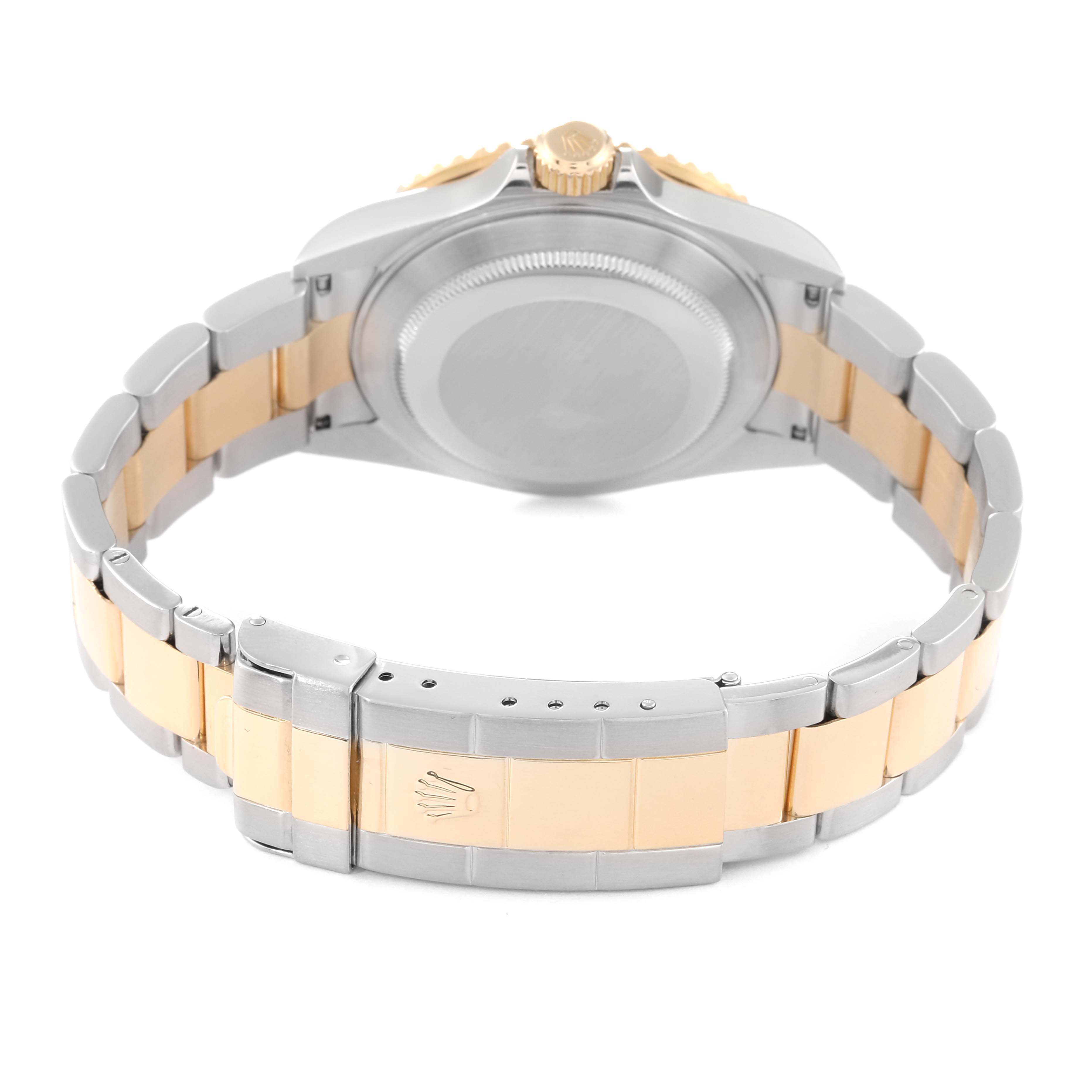 This is a rear view of a Rolex Submariner 16613 Men's Steel and Gold (two tone) Black Dial 16613 Men's Steel and Gold (two tone) Black Dial watch showing the case back and the two-tone bracelet with the clasp.