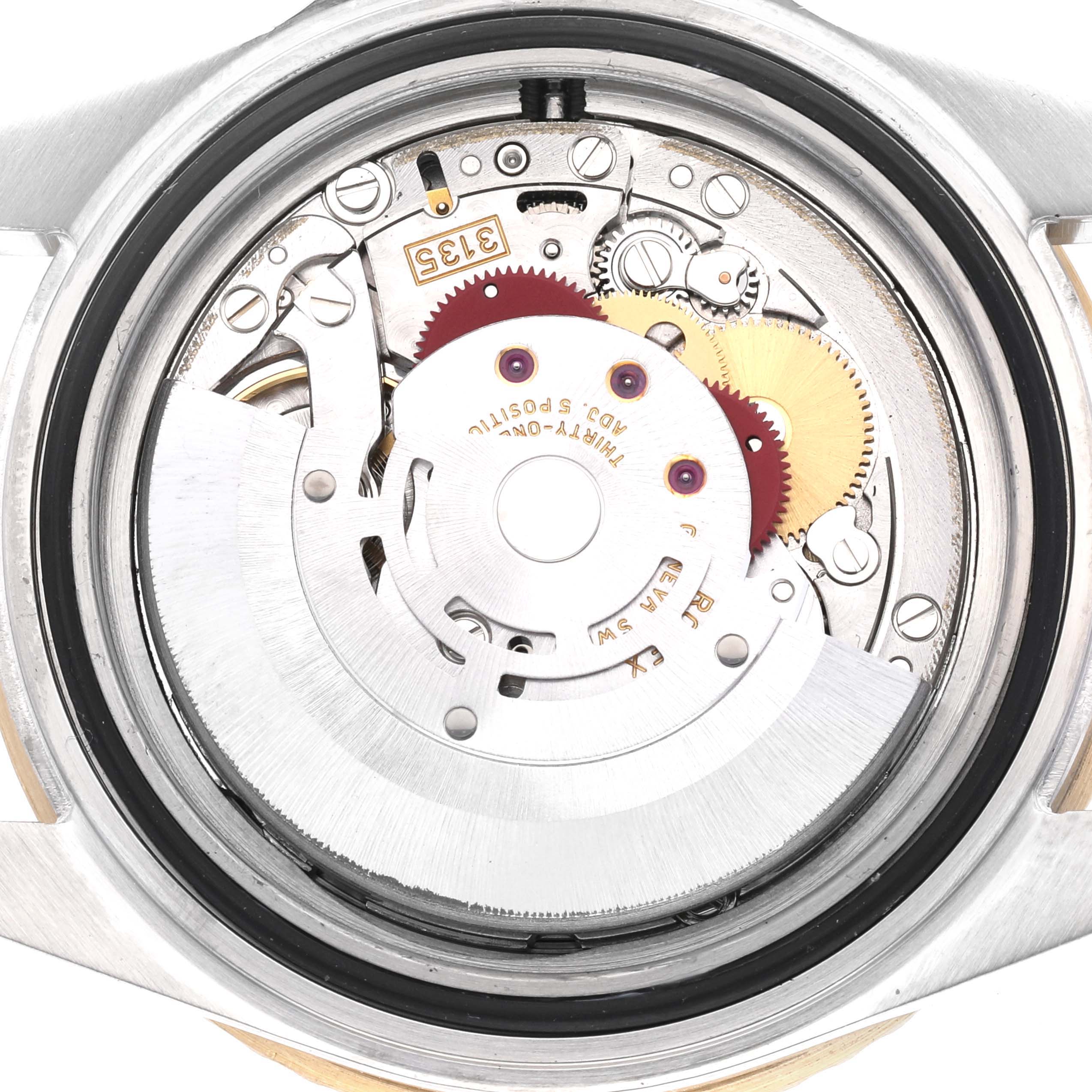 The image shows a close-up of the movement mechanism of a Rolex Submariner 16613 Men's Steel and Gold (two tone) Black Dial 16613 Men's Steel and Gold (two tone) Black Dial, viewed from the back.
