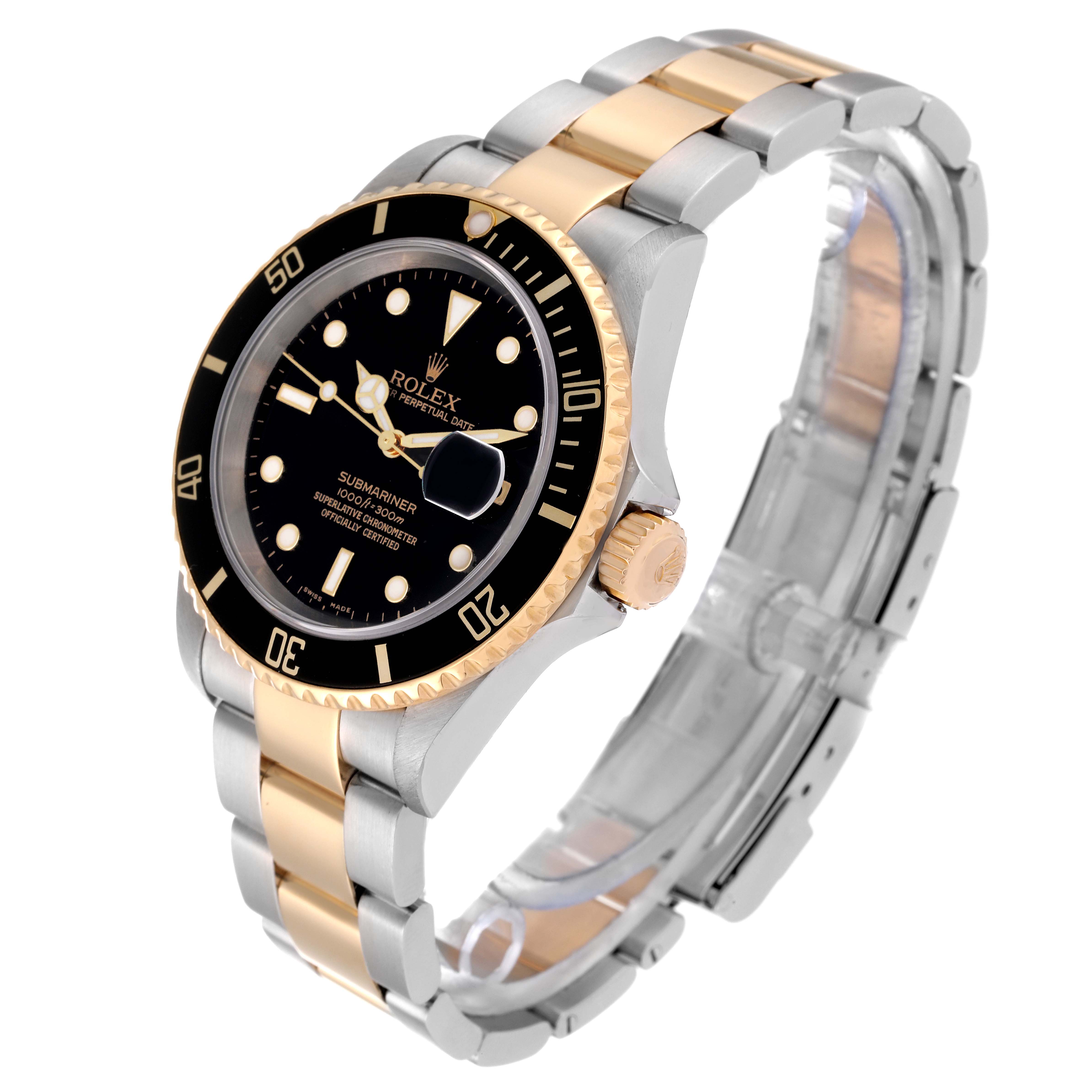 This Rolex Submariner 16613 Men's Steel and Gold (two tone) Black Dial 16613 Men's Steel and Gold (two tone) Black Dial watch is shown at a three-quarter angle, highlighting the dial, bezel, and two-tone bracelet.