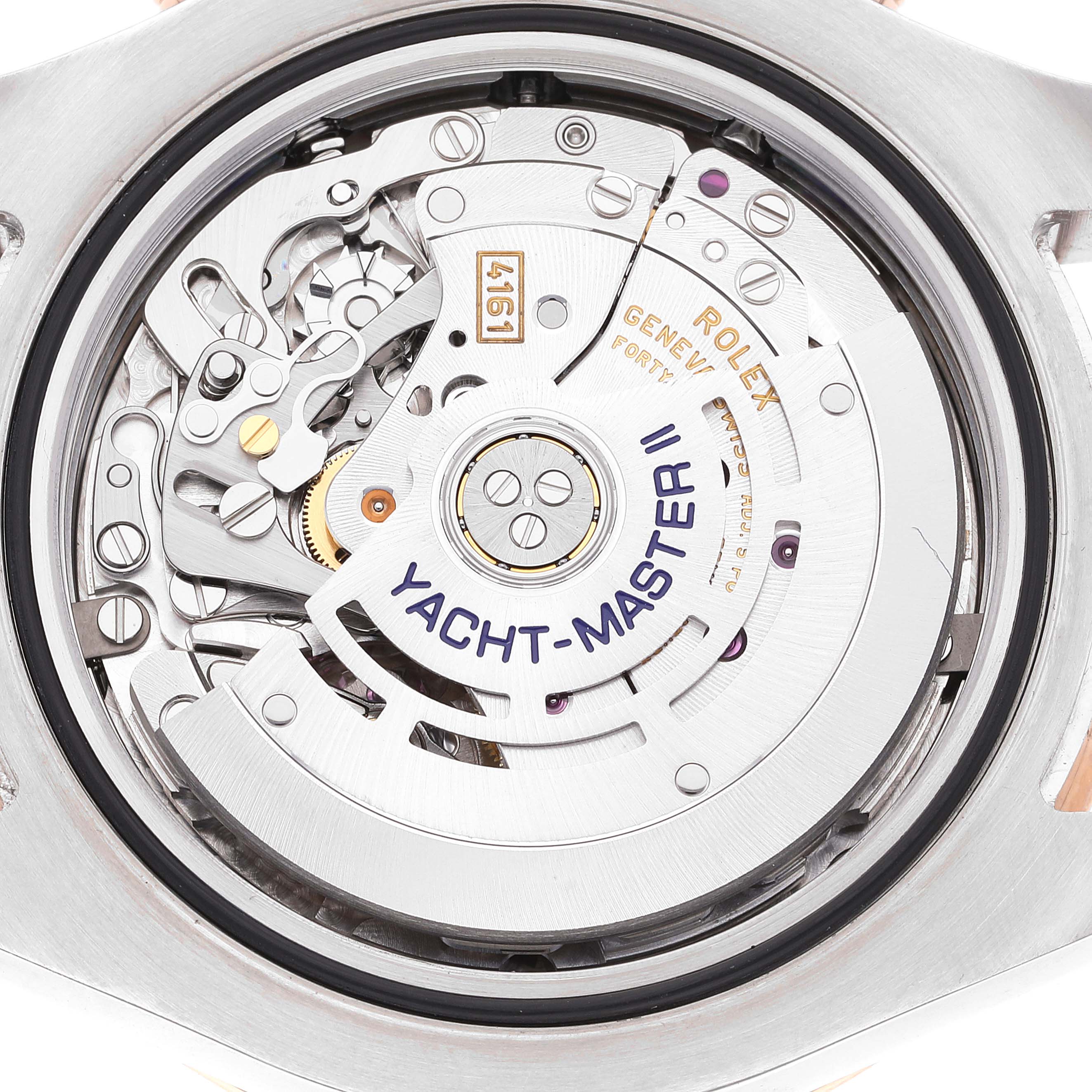 This image shows the detailed internal mechanism of the Rolex Yacht-Master 116681 Men
s Steel and Gold (two tone) White Dial 116681 Men
s Steel and Gold (two tone) White Dial II watch from a back angle.