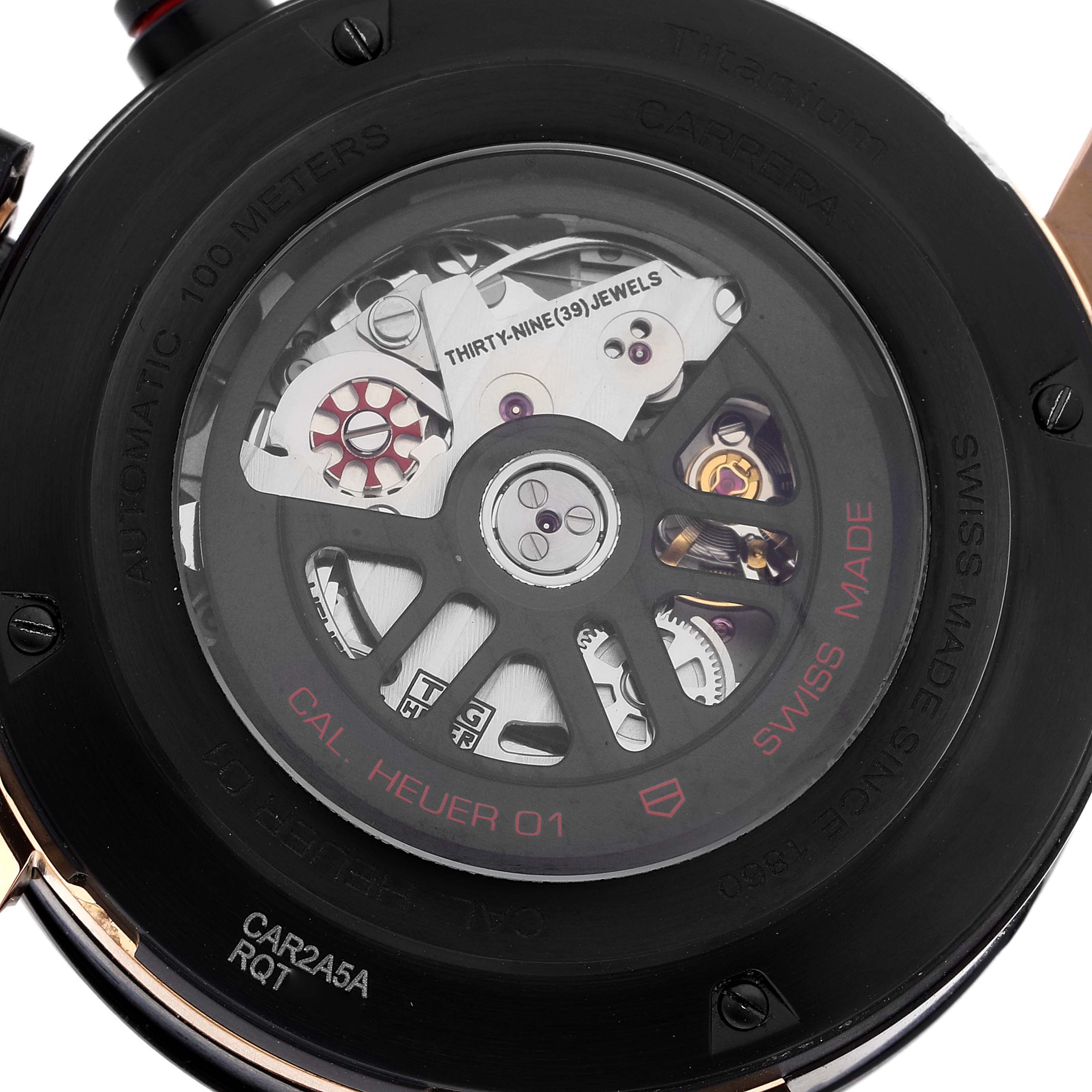 This image shows the case back of a Tag Heuer Carrera CAR2A5A.FT6044 Men's Titanium Black Dial CAR2A5A.FT6044 Men's Titanium Black Dial watch, displaying the intricate mechanical movement inside.
