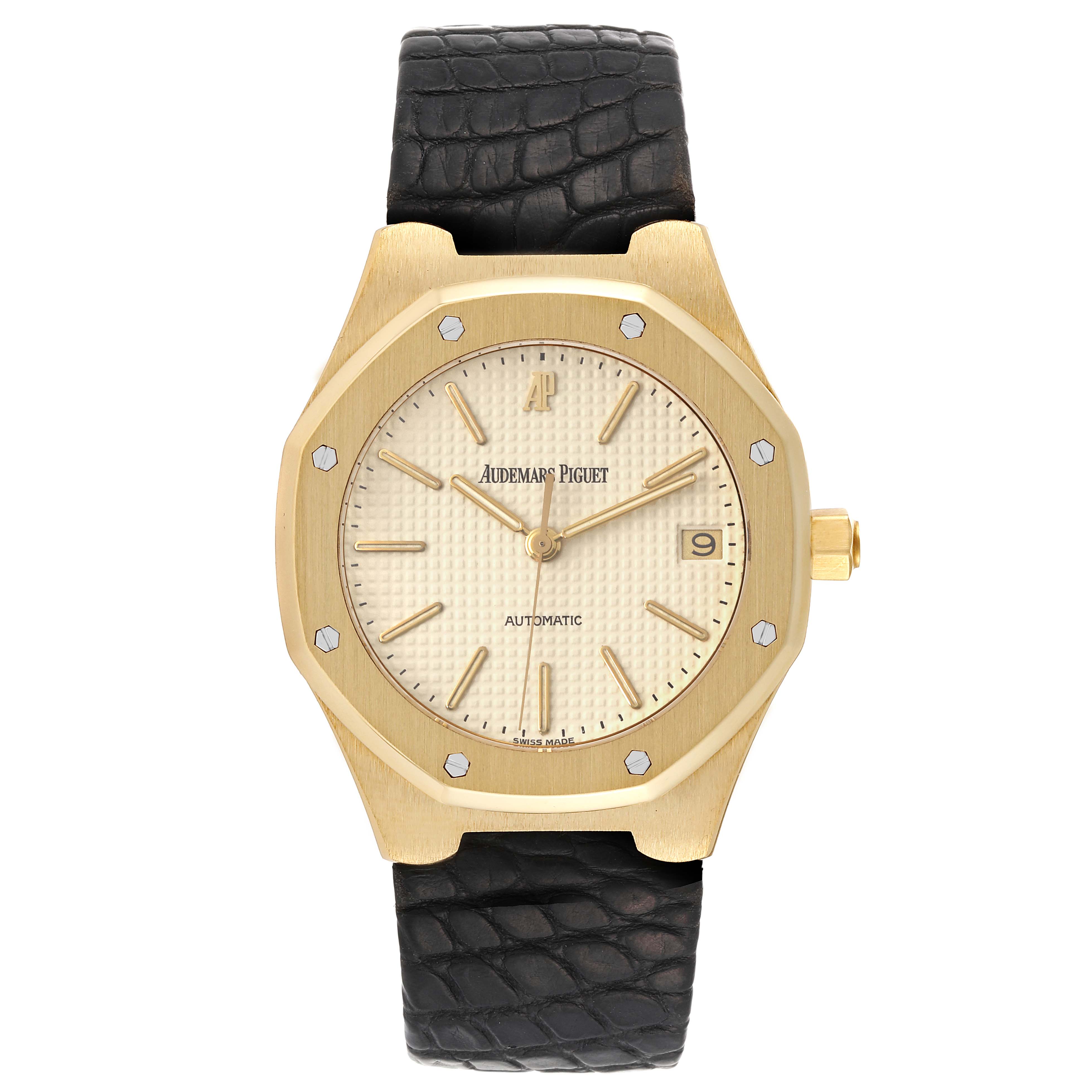 This image shows a front view of an Audemars Piguet Royal Oak 14808BA Men's Yellow Gold Beige Dial 14808BA Men's Yellow Gold Beige Dial watch, featuring its face, case, and strap.