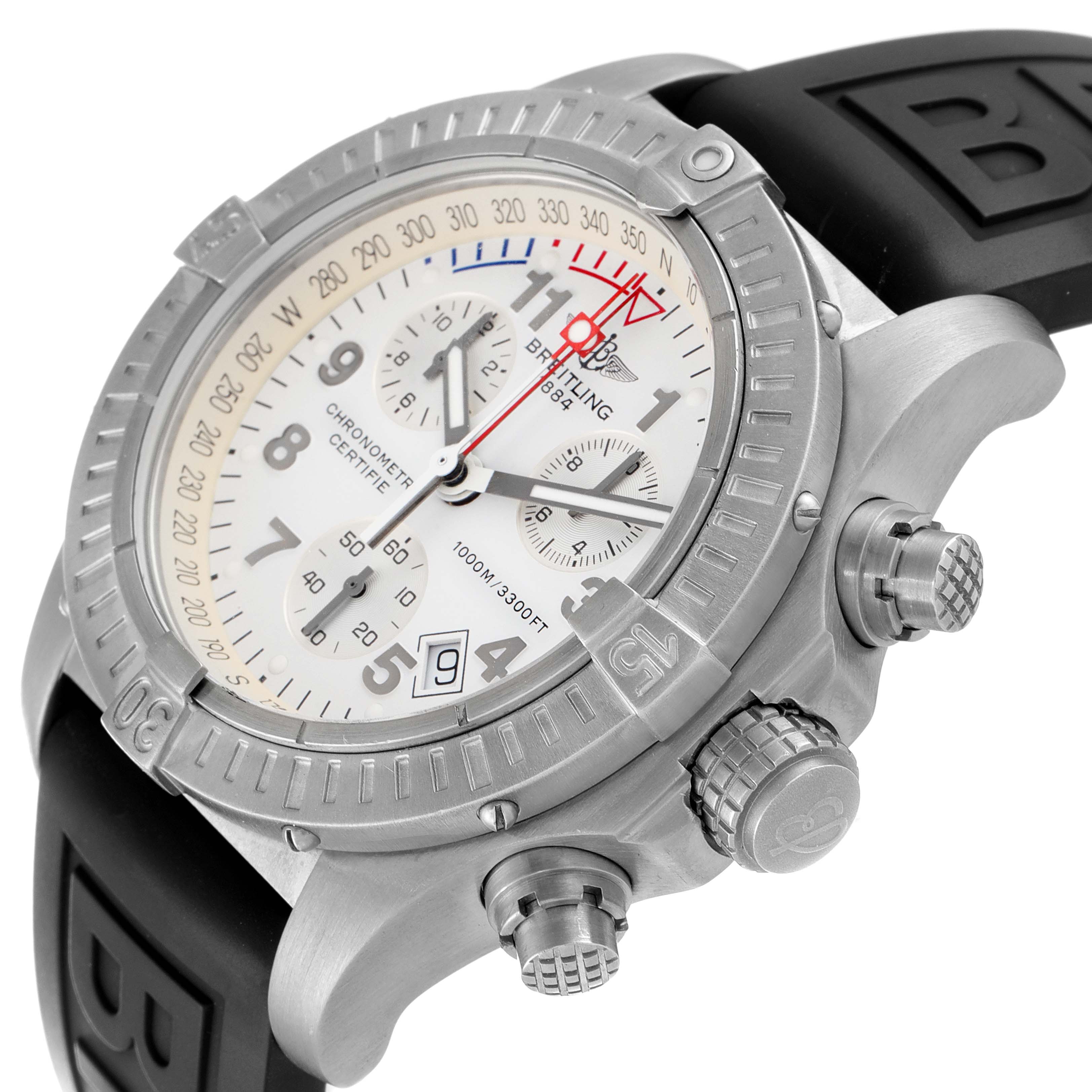 The Breitling Avenger E73360 Men's Titanium White Dial E73360 Men's Titanium White Dial watch is shown at an angle that highlights the case, bezel, dial, pushers, and part of the strap.