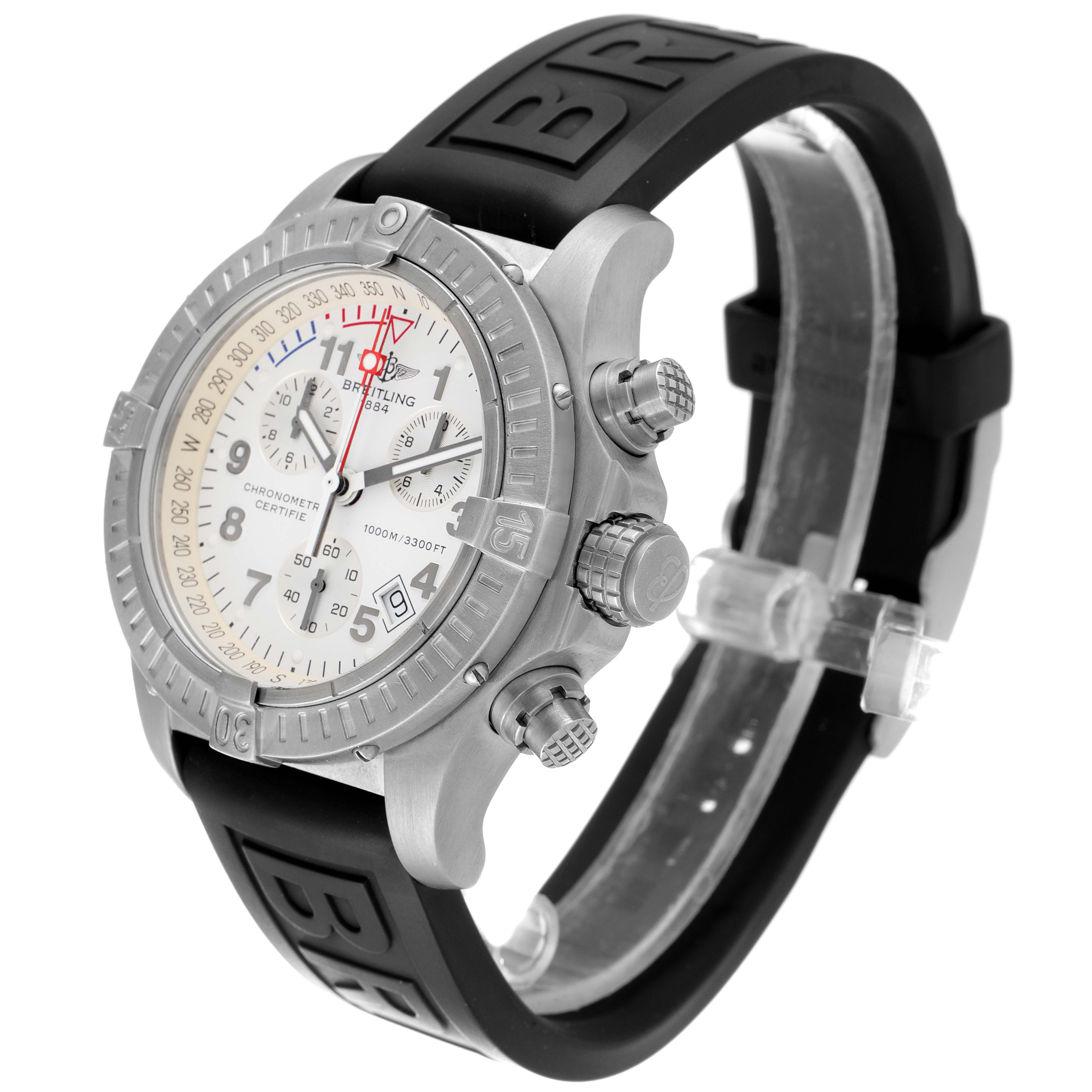 The image shows a Breitling Avenger E73360 Men's Titanium White Dial E73360 Men's Titanium White Dial watch at a three-quarter angle, highlighting its face, bezel, crown, pushers, and rubber strap.