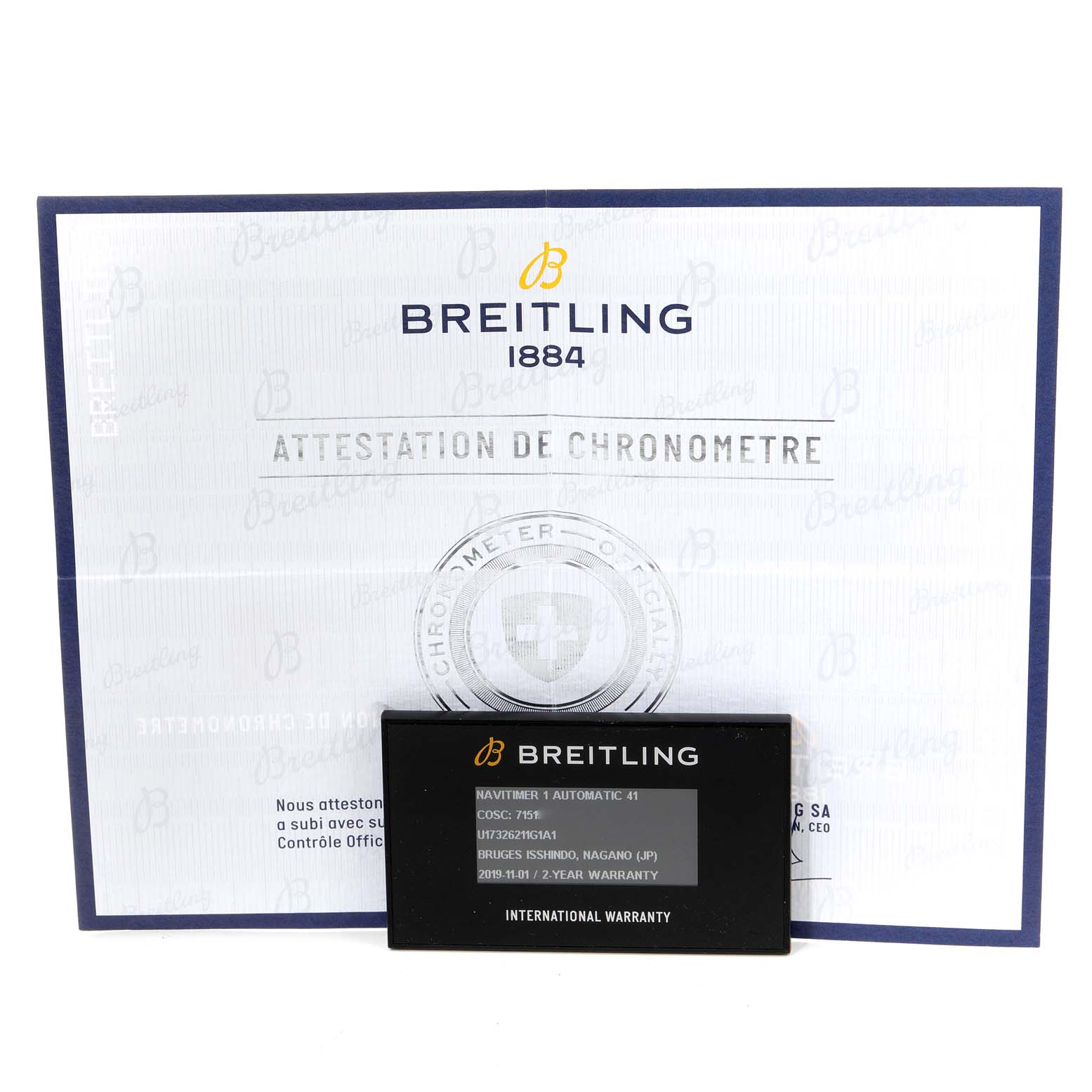 The image shows the certification and warranty card for a Breitling Navitimer U17326 Men's Steel and Gold (two tone) Silver Dial U17326 Men's Steel and Gold (two tone) Silver Dial watch, photographed straight on.