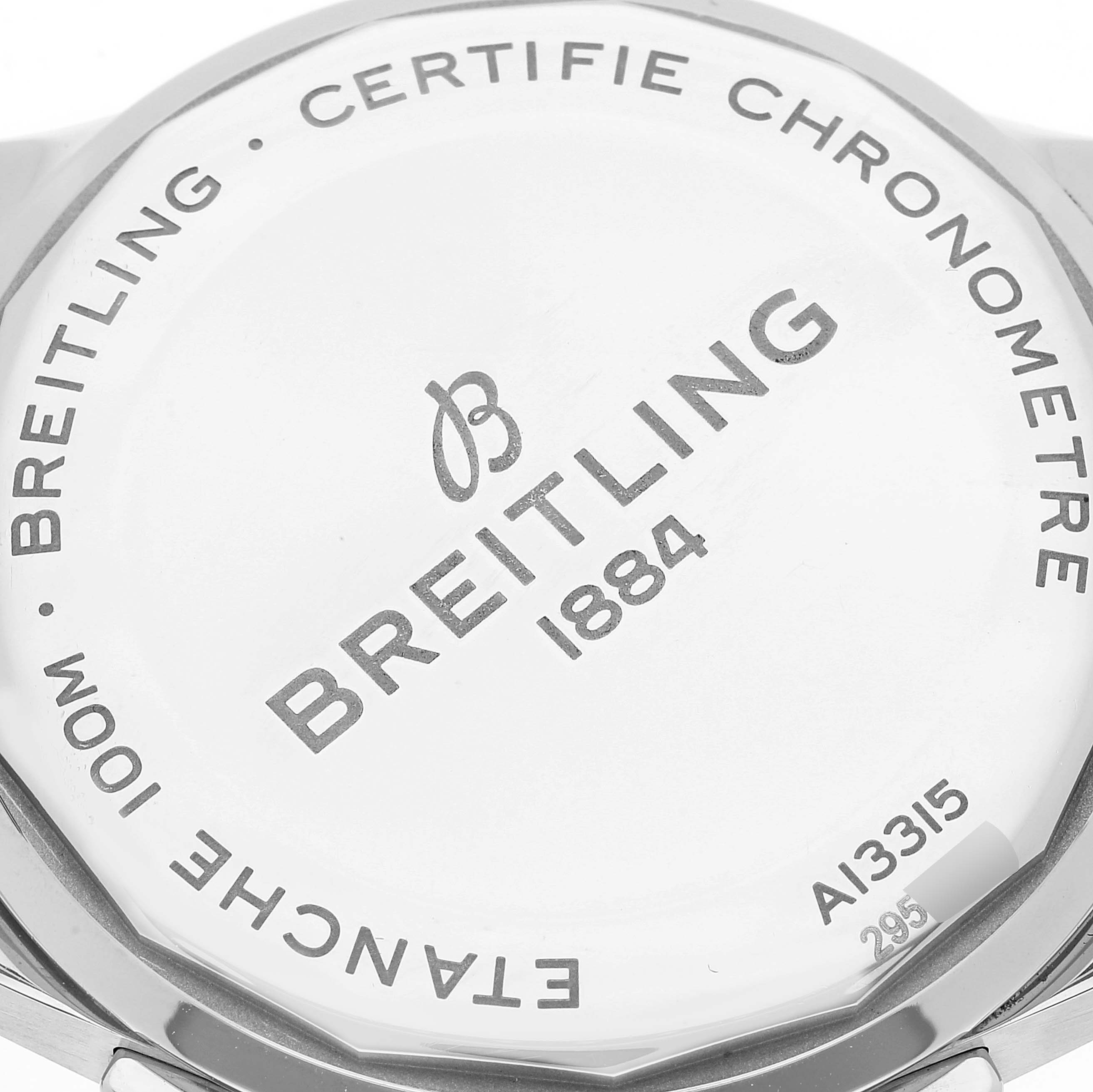 The image shows the back case of a Breitling Premier A13315 Men's Stainless Steel Black Dial A13315 Men's Stainless Steel Black Dial model watch, highlighting its branding and engravings.