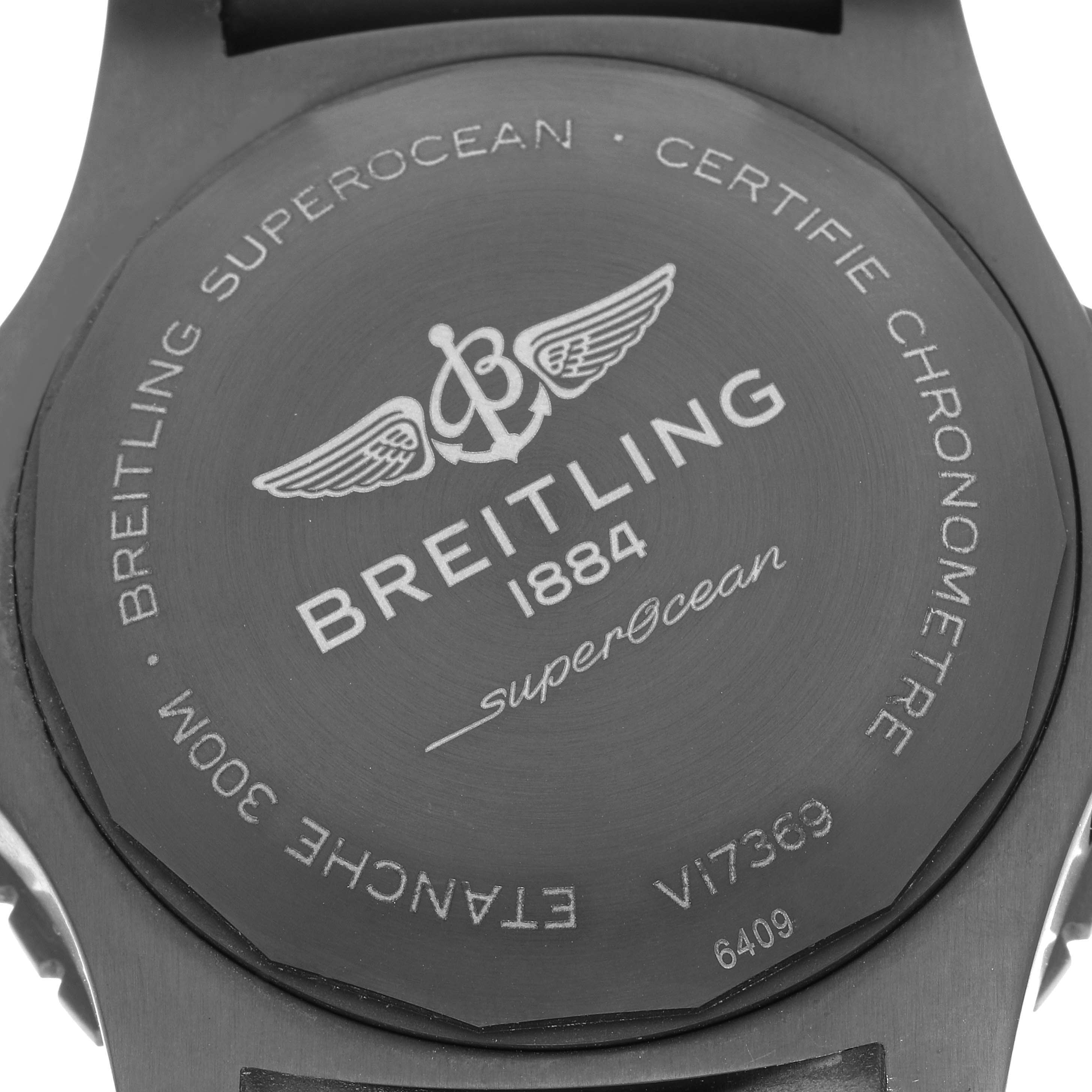 The image shows the back casing of a Breitling Superocean V17369 Men's Titanium Green Dial V17369 Men's Titanium Green Dial watch, highlighting the brand logo and engraved details.