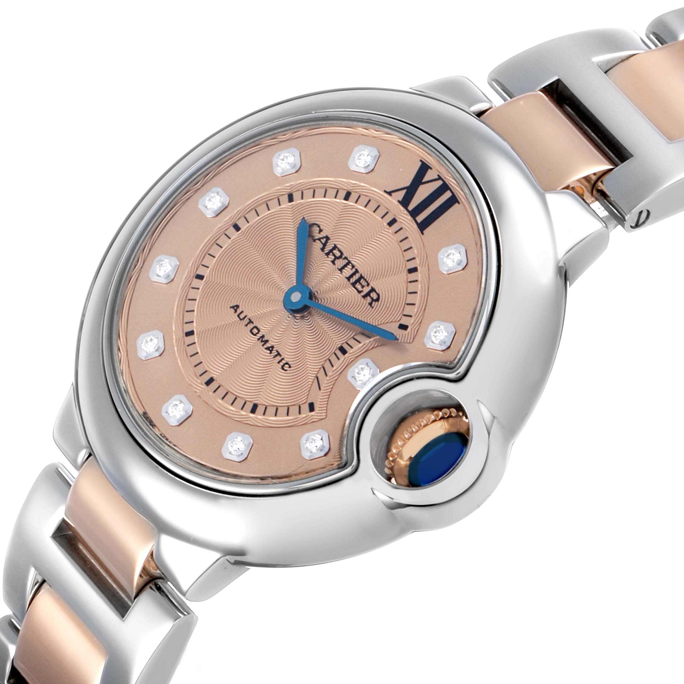 The Cartier Ballon Bleu WE902053 Women's Steel and Gold (two tone) Pink Dial watch is angled to show the face, crown, and part of the bracelet.