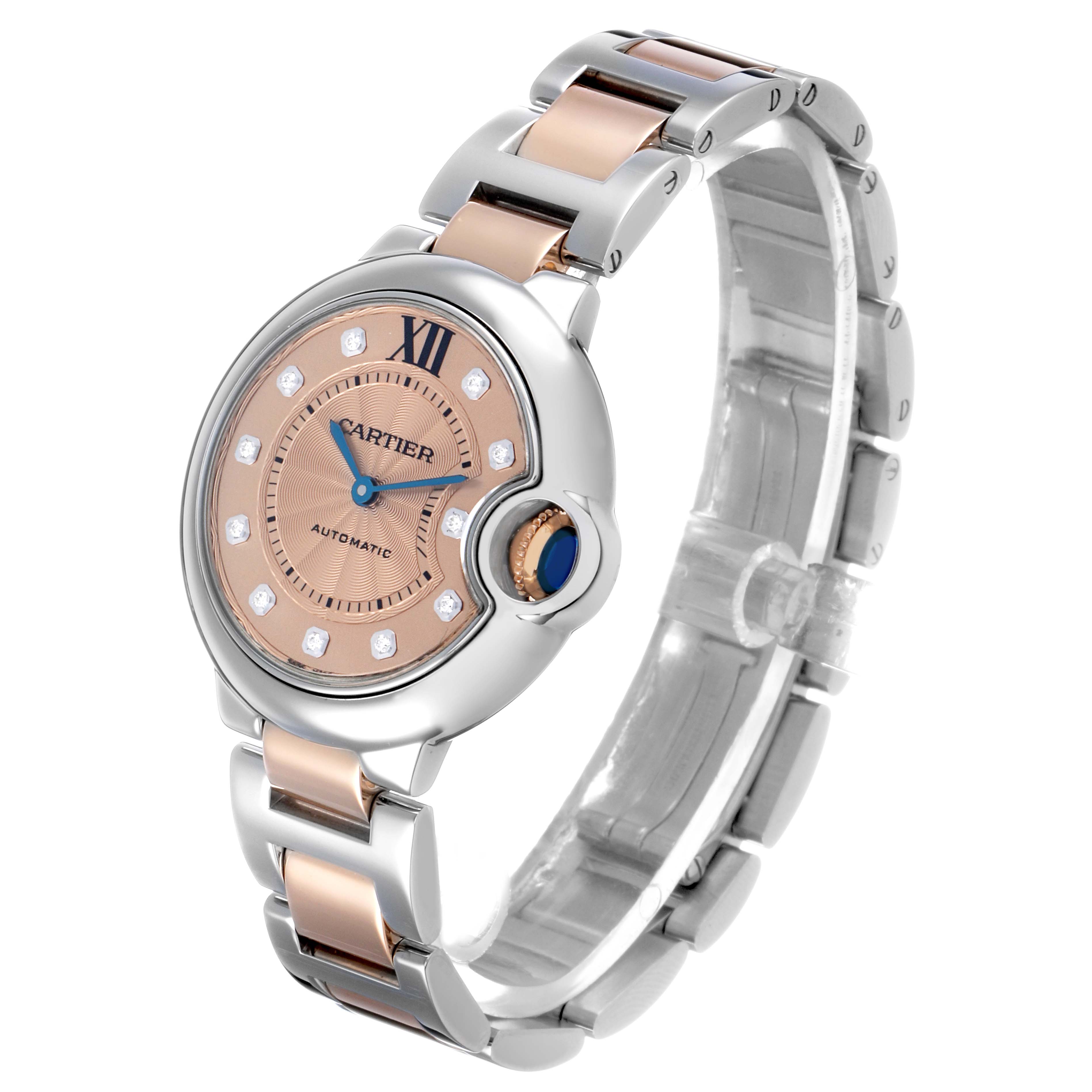 The Cartier Ballon Bleu WE902053 Women's Steel and Gold (two tone) Pink Dial watch is shown in a side angle, displaying the face, bracelet, and crown.