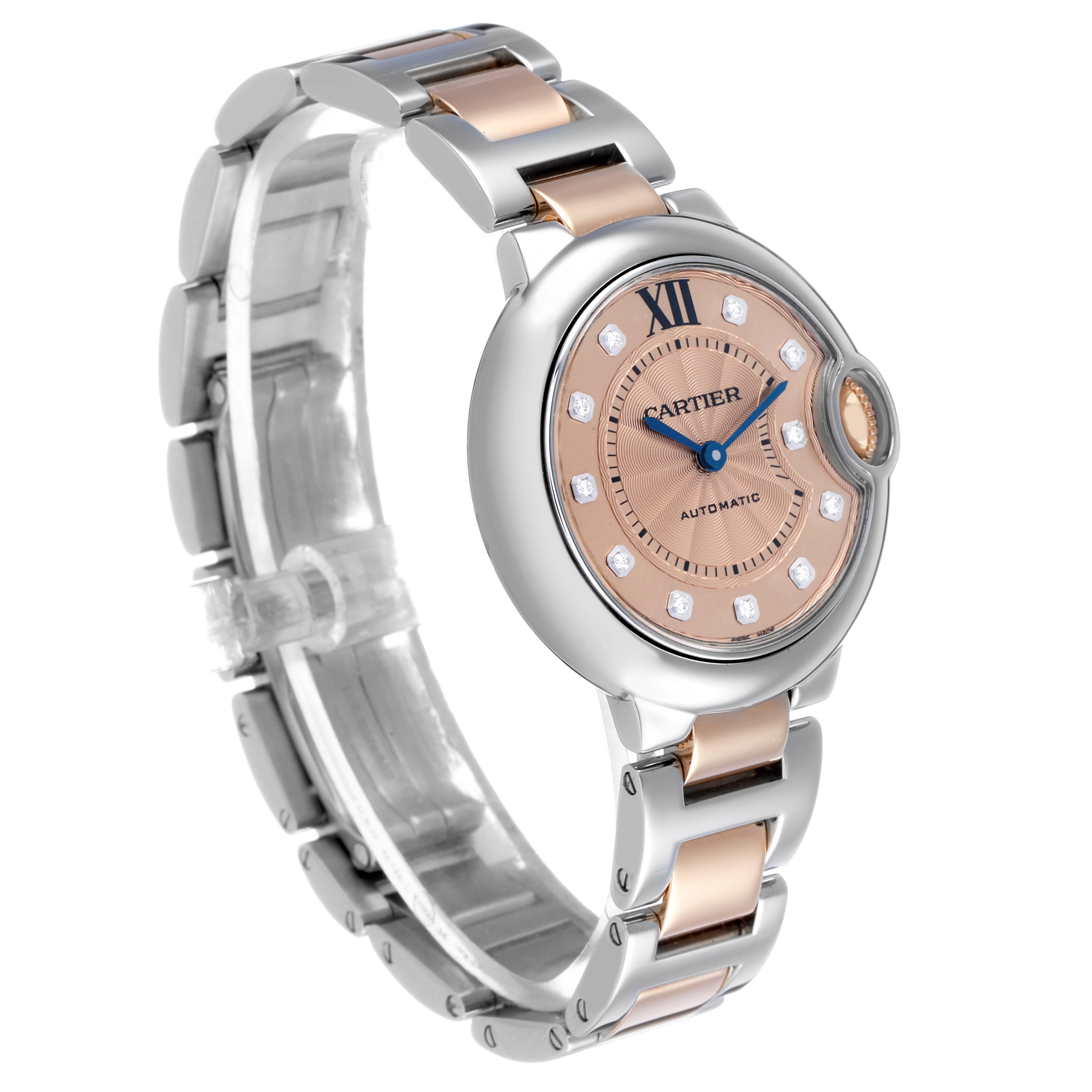 The Cartier Ballon Bleu WE902053 Women's Steel and Gold (two tone) Pink Dial watch is shown at a three-quarter angle, highlighting the face, bracelet, and crown.