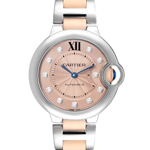 The Cartier Ballon Bleu WE902053 Women's Steel and Gold (two tone) Pink Dial watch is shown from the front, displaying the dial, hands, and part of the bracelet.