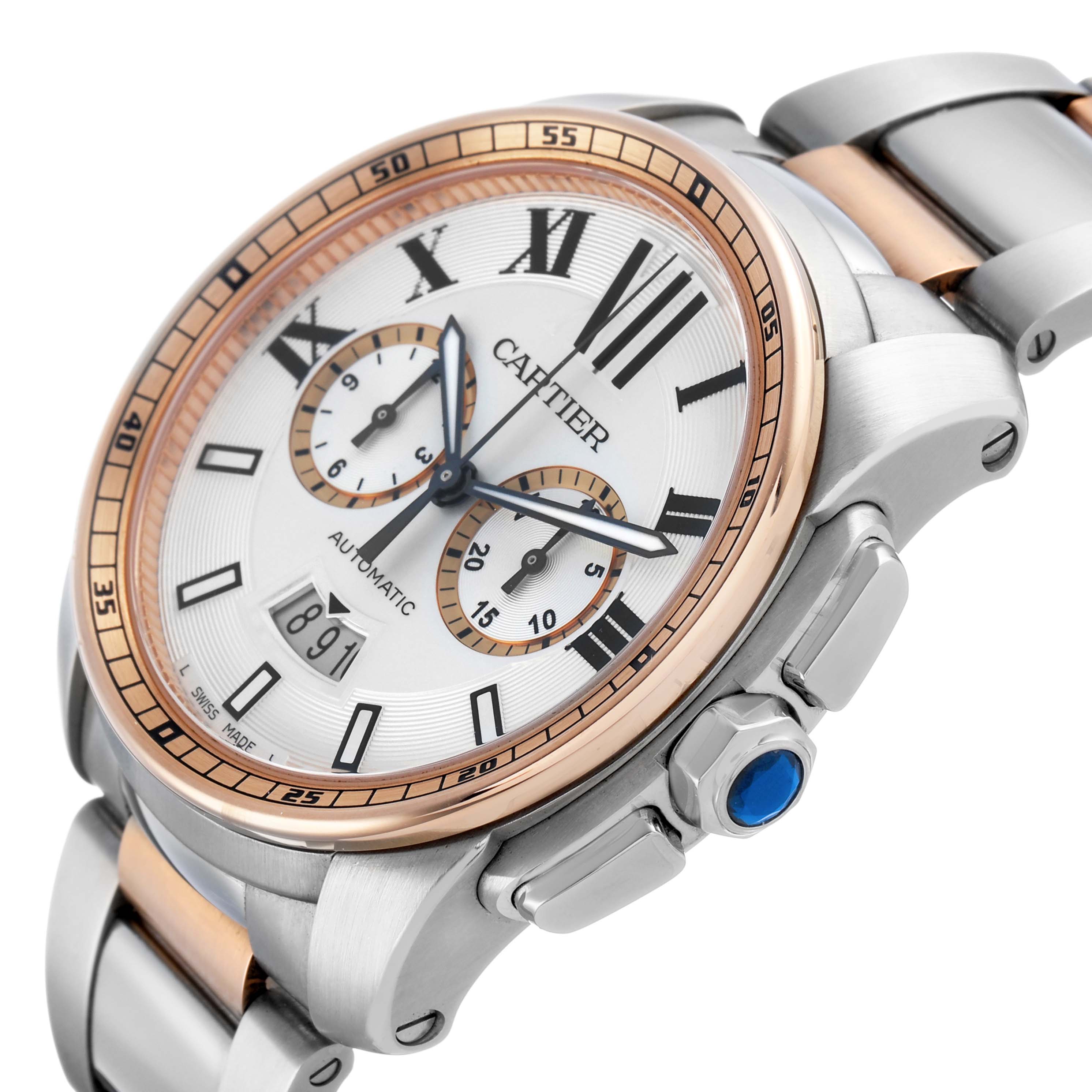 The Calibre de Cartier watch is shown at an angled side view, highlighting the dial, bezel, crown, and a portion of the bracelet.