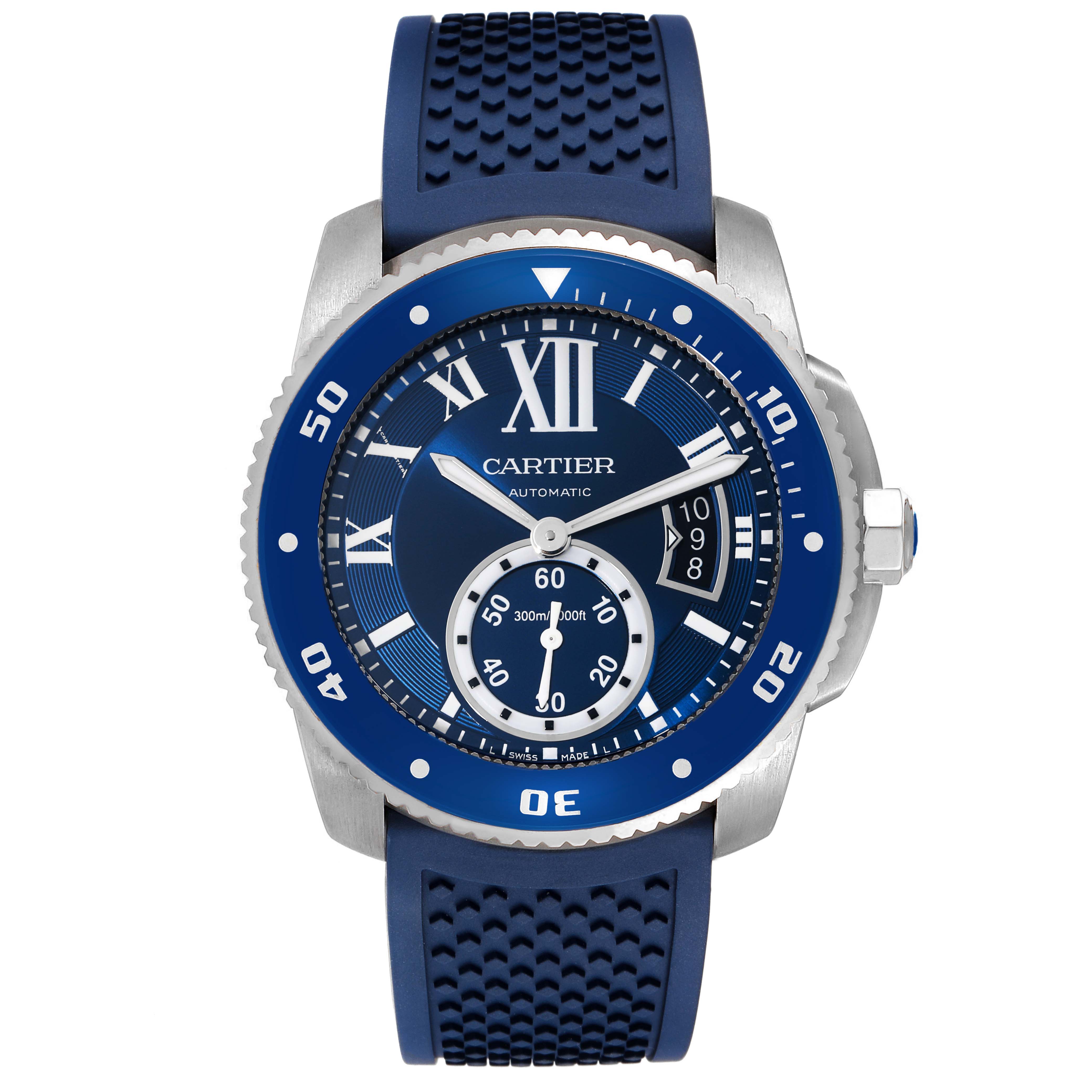 The image shows a frontal view of the Calibre de Cartier watch by Cartier, displaying its blue dial, bezel, and strap.