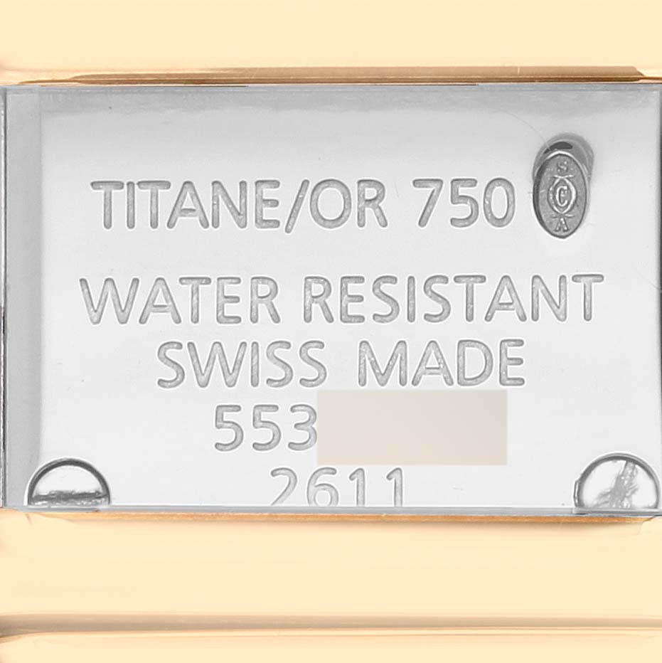 This image shows the back case of a Declaration model by Cartier, featuring water resistance and material information.