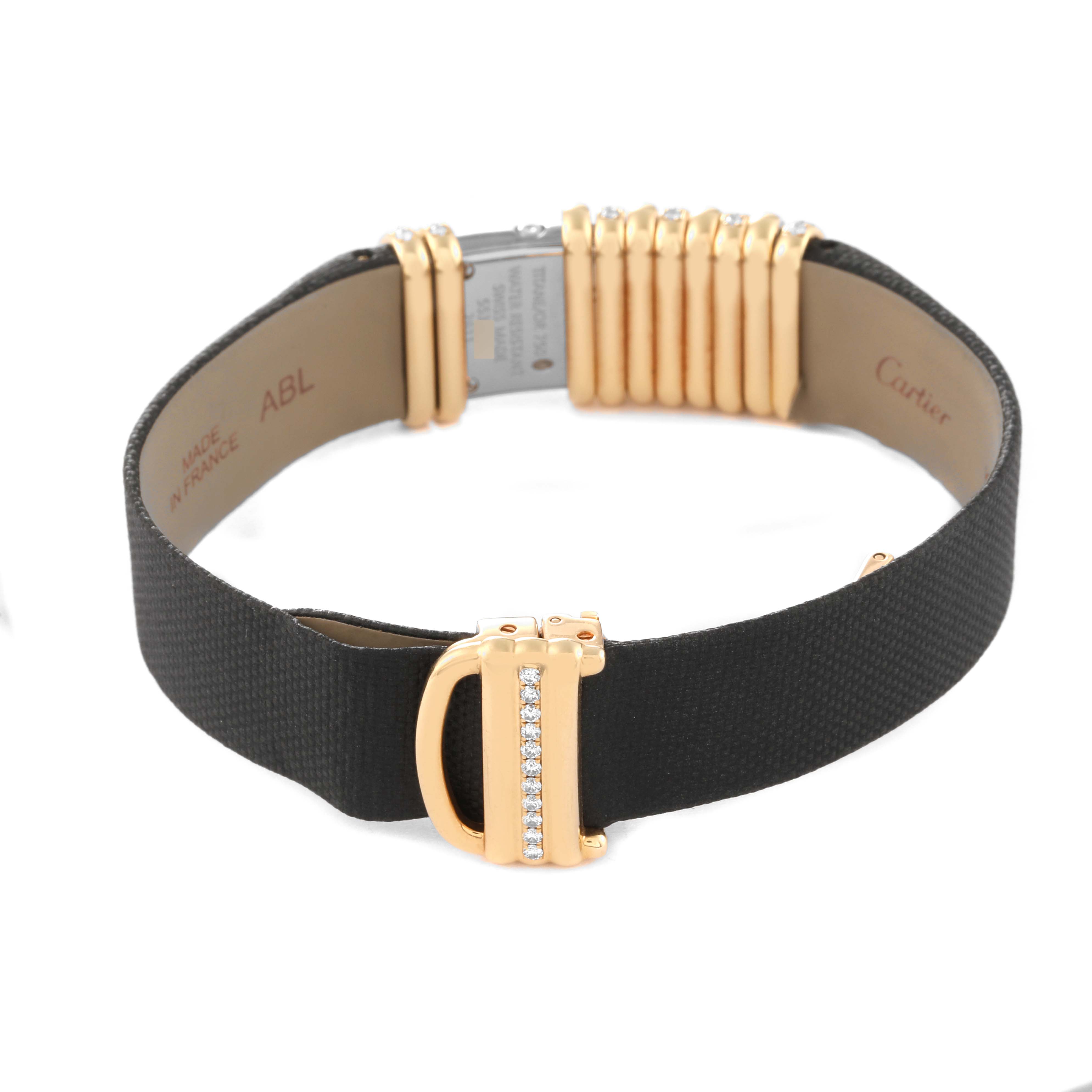 The image shows the back view of a Cartier Declaration WT000150 Women's Titanium Silver Dial WT000150 Women's Titanium Silver Dial model watch, focusing on the strap and clasp.